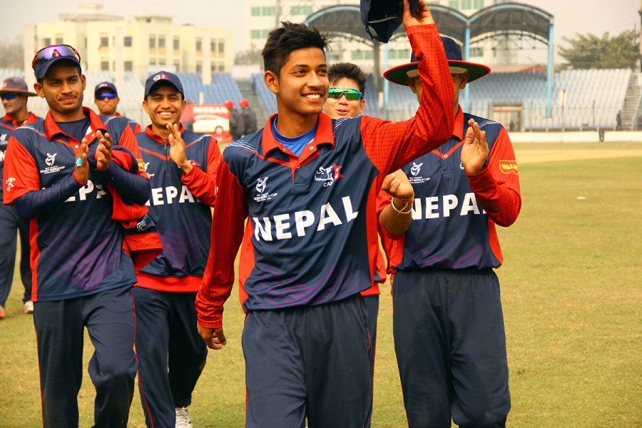 Sandeep Lamichhane acknowledges the crowd while playing for Nepal. Photo: Handout