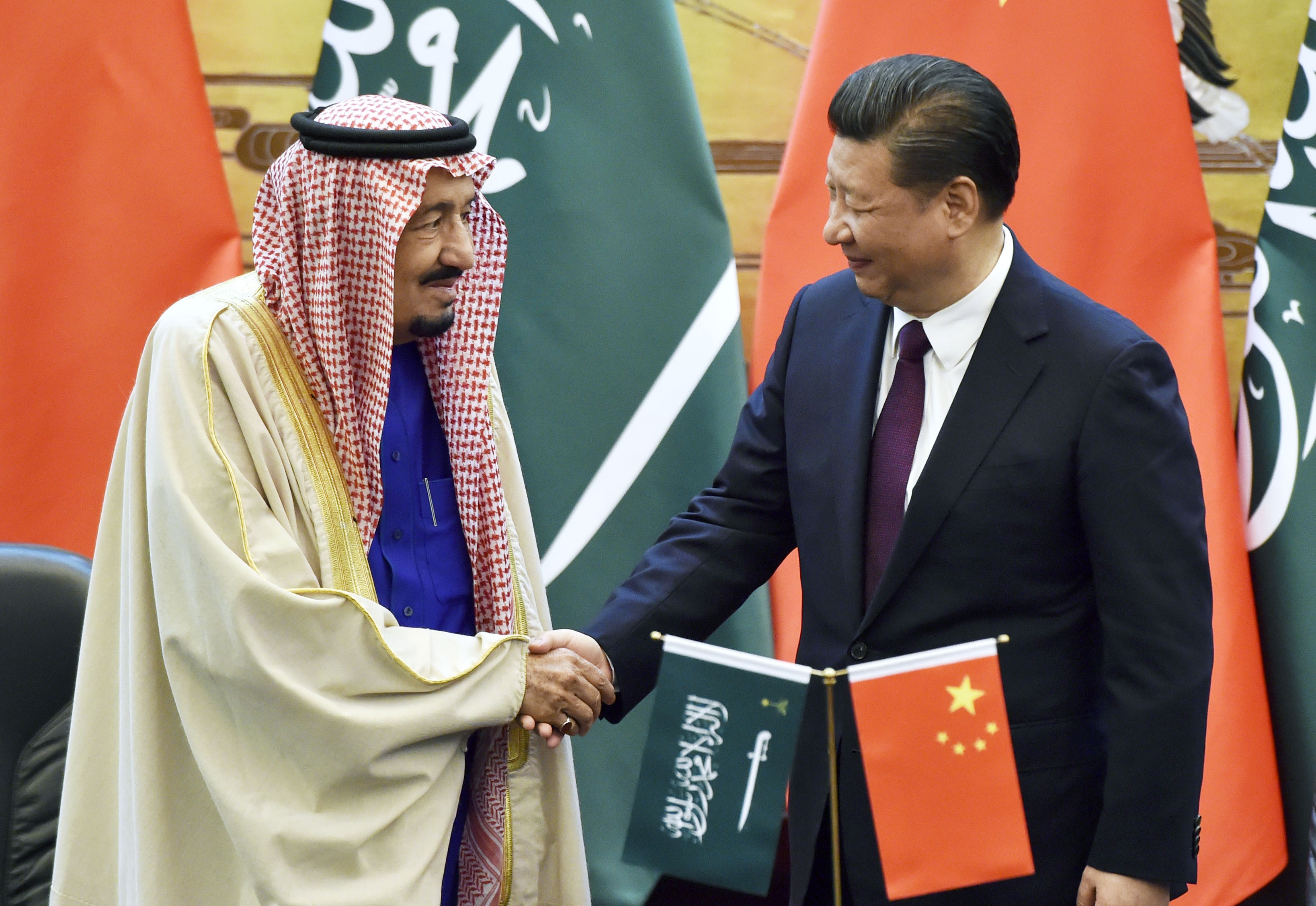 Chinese President Xi Jinping and Saudi Arabia’s King Salman shake hands in Beijing on March 16, 2017, after signing 14 agreements on economic cooperation worth US$65 billion. Photo: Kyodo