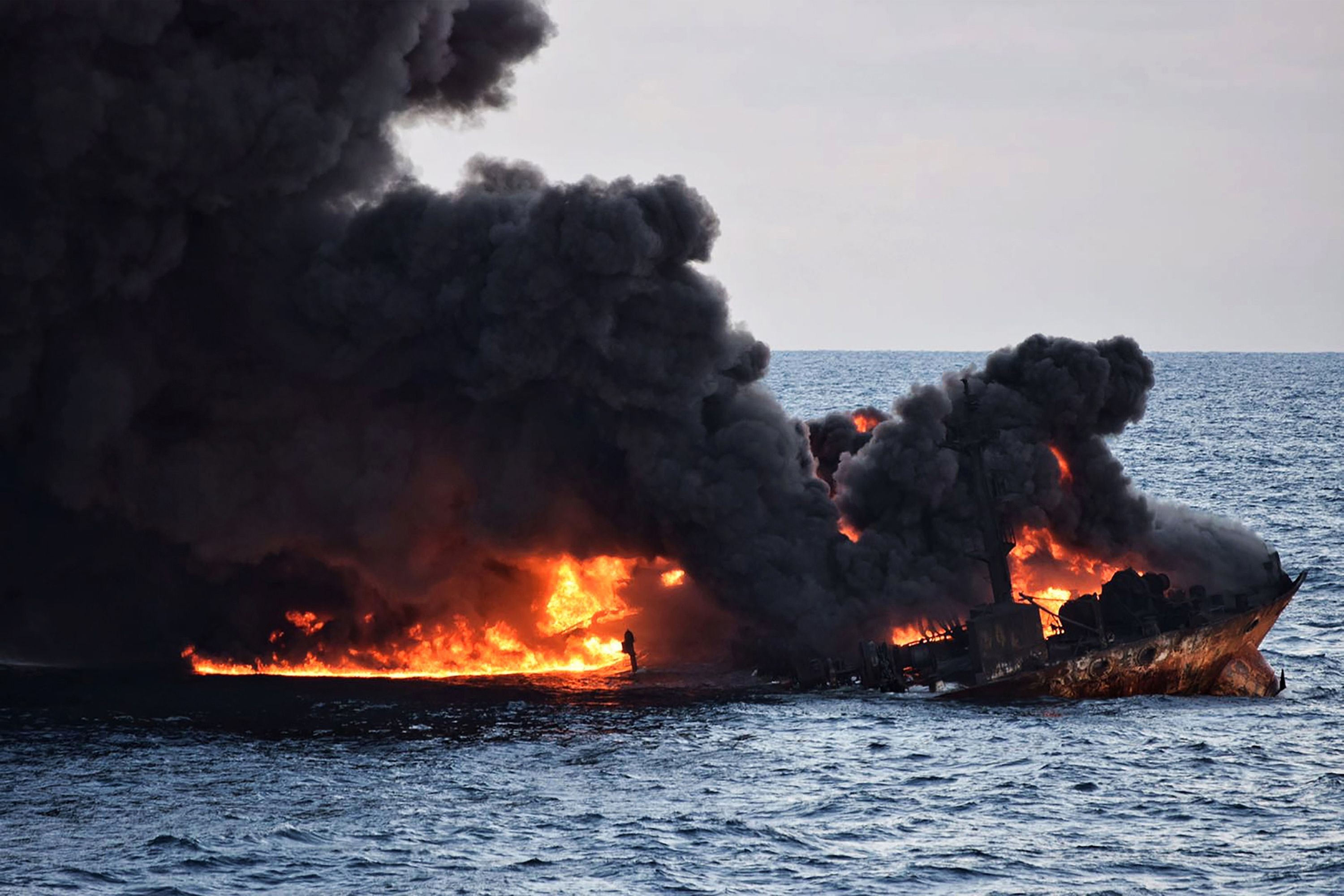 Smoke and flames rose from the burning oil tanker Sanchi after it collided with the CF Crystal, a Hong Kong-registered bulk freighter, on January 6. Photo: AFP 