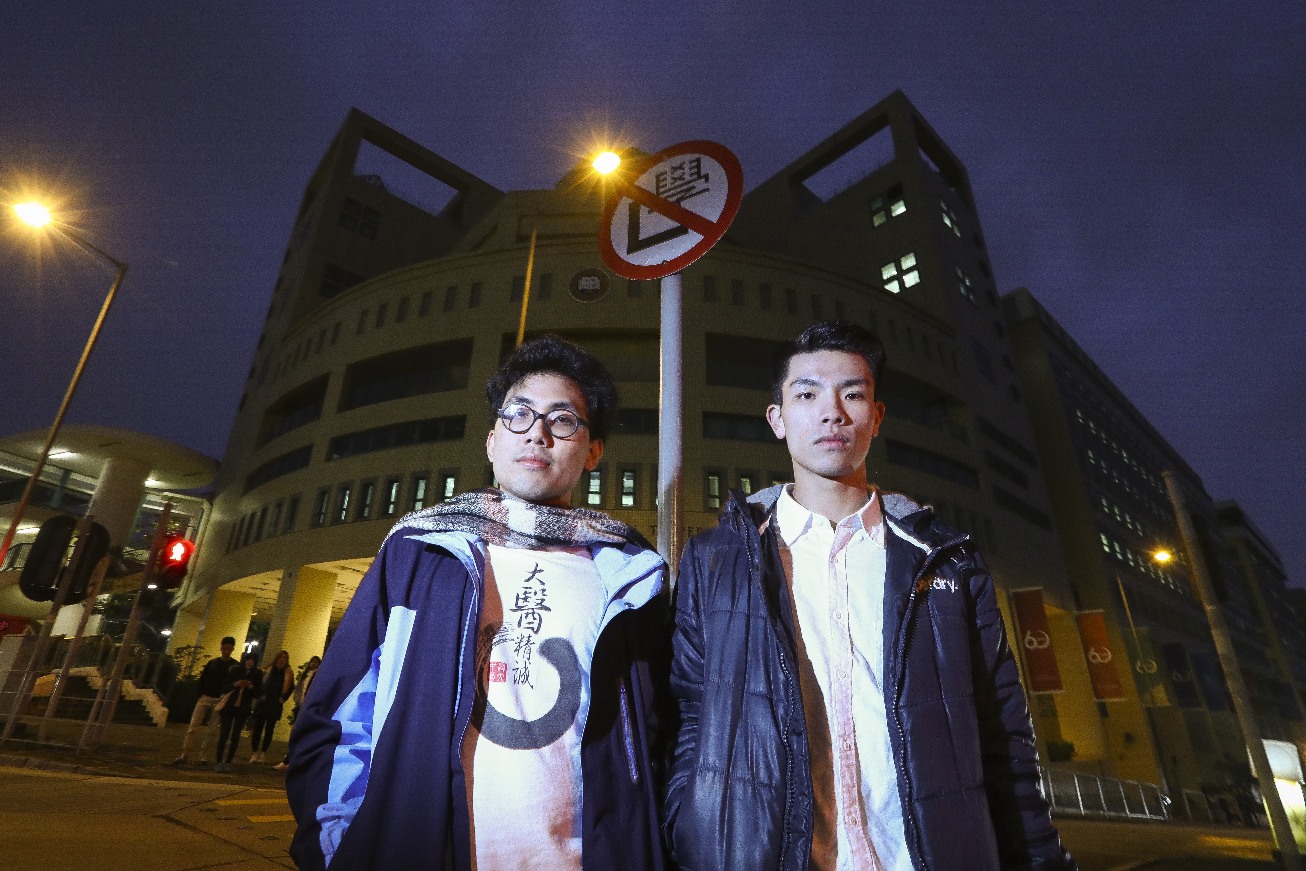 Andrew Chan (left) and Lau Tsz-kei (right) were reinstated to their classes after apologising in person to staff involved in the heated row. Photo: Nora Tam