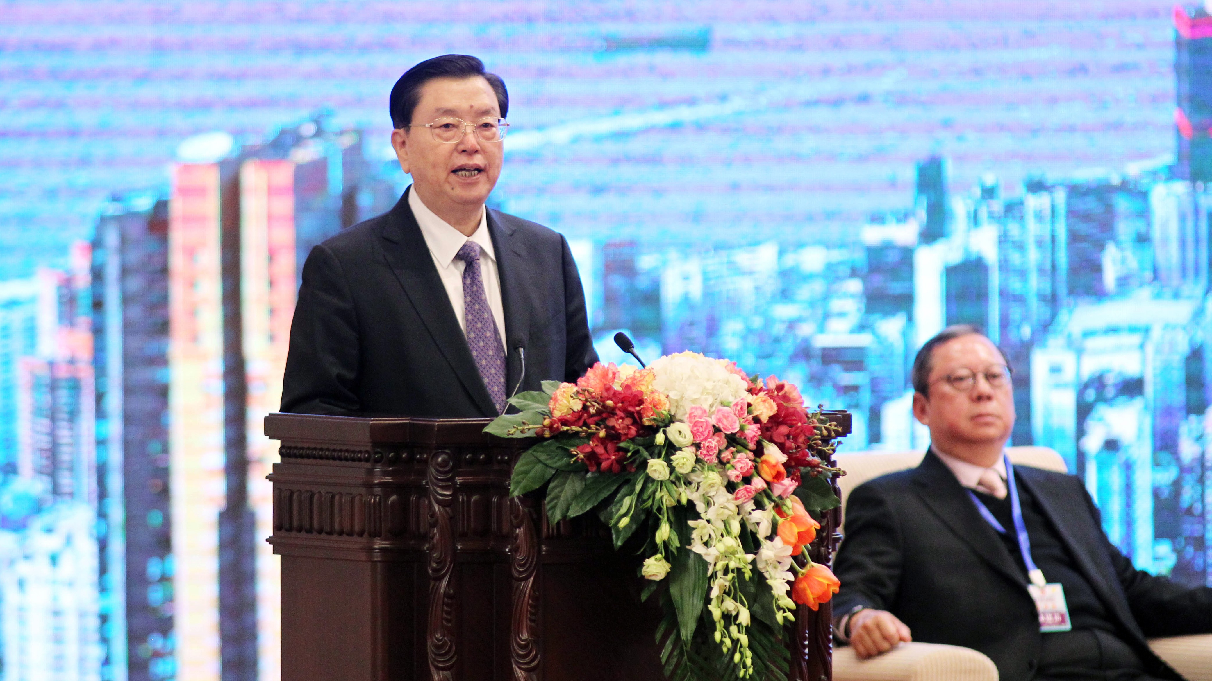 Zhang Dejiang said the central government would never forget the ‘historic contribution’ the city had made in the national development. Photo: Simon Song