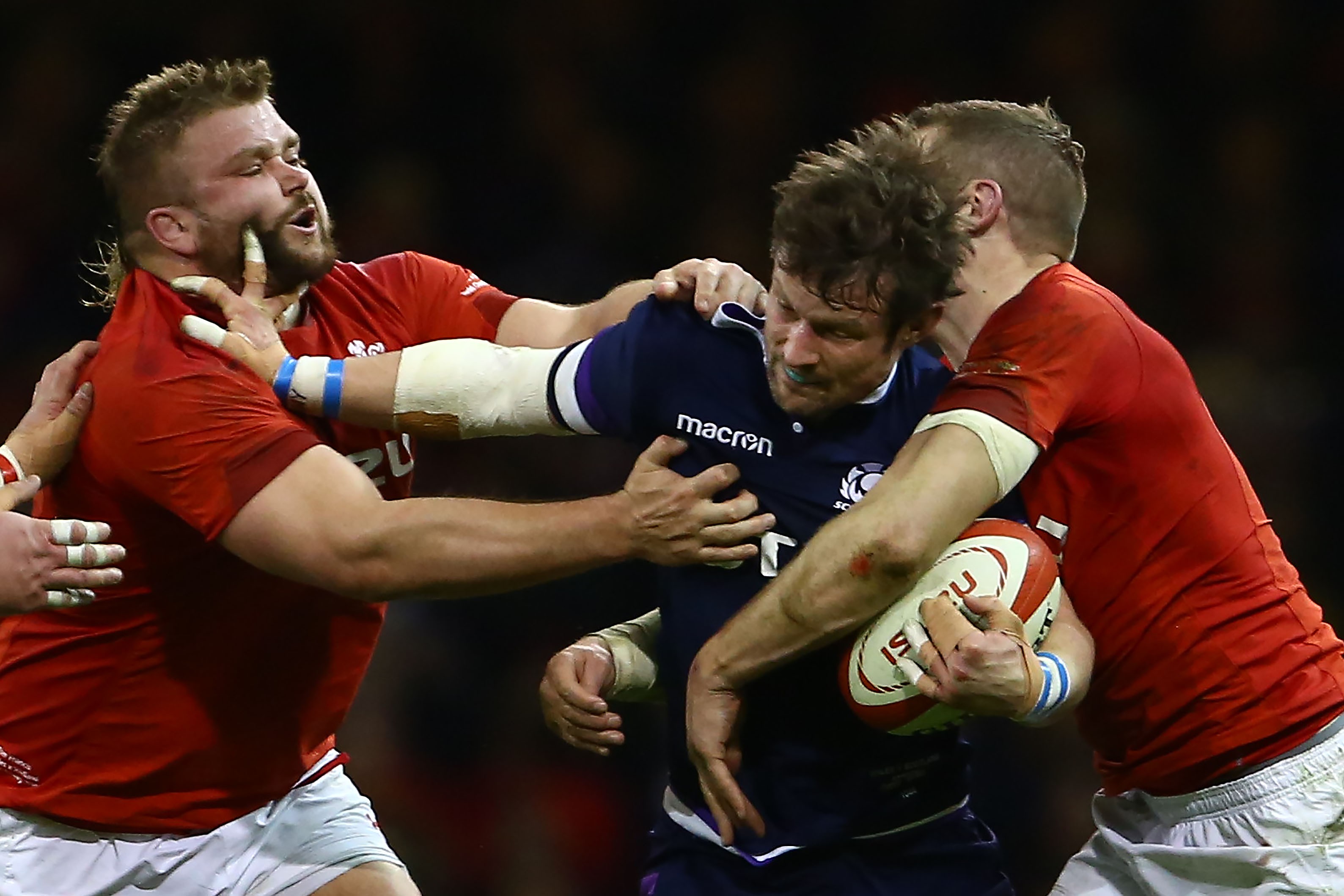 Scotland centre Pete Horne (C) is tackled by Wales’ Tomas Francis (L) and Wales’ centre Hadleigh Parkes during their opening Six Nations loss. Photo: AFP