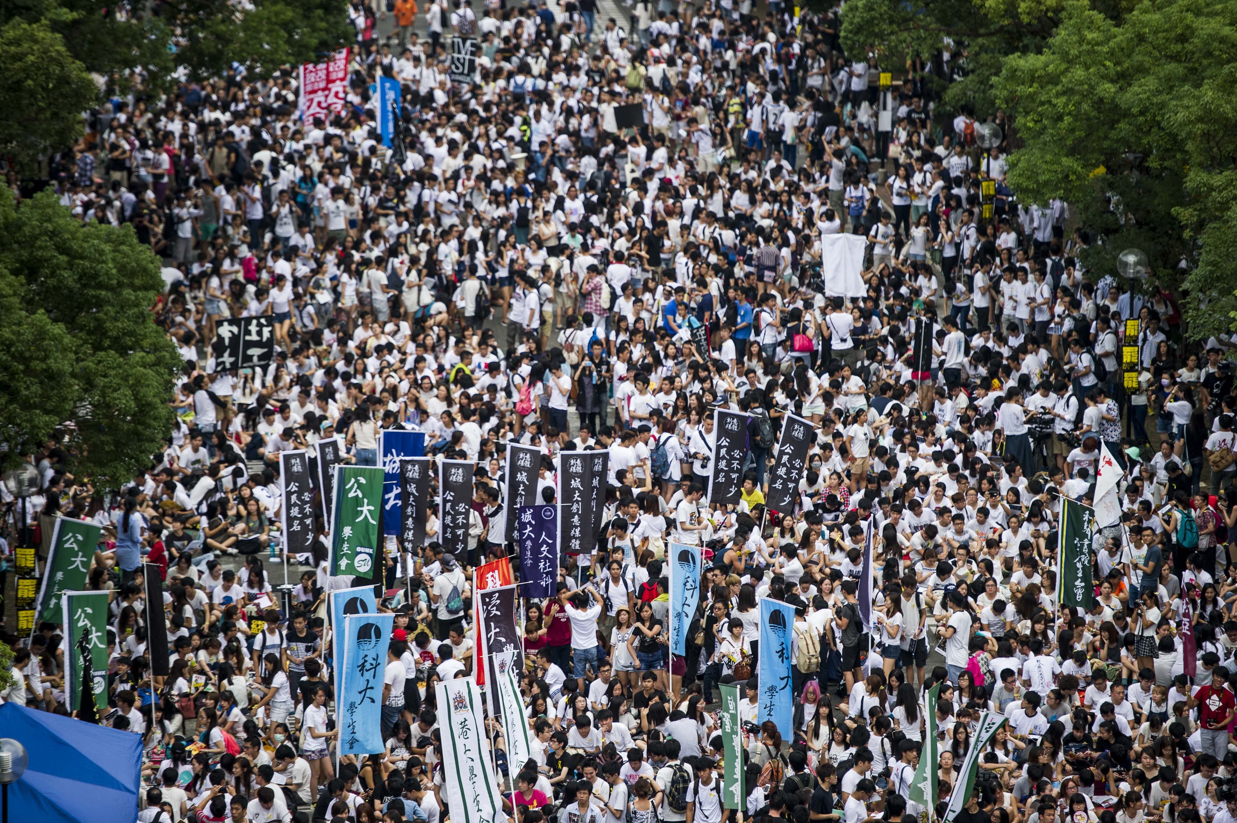 Students gather at Chinese University to mark the start of a week-long class boycott to protest at the central government’s refusal to grant Hong Kong full universal suffrage. This protest culminated in a march to the Hong Kong government headquarters in Admiralty and kicked off the Occupy Central movement. Photo: AFP