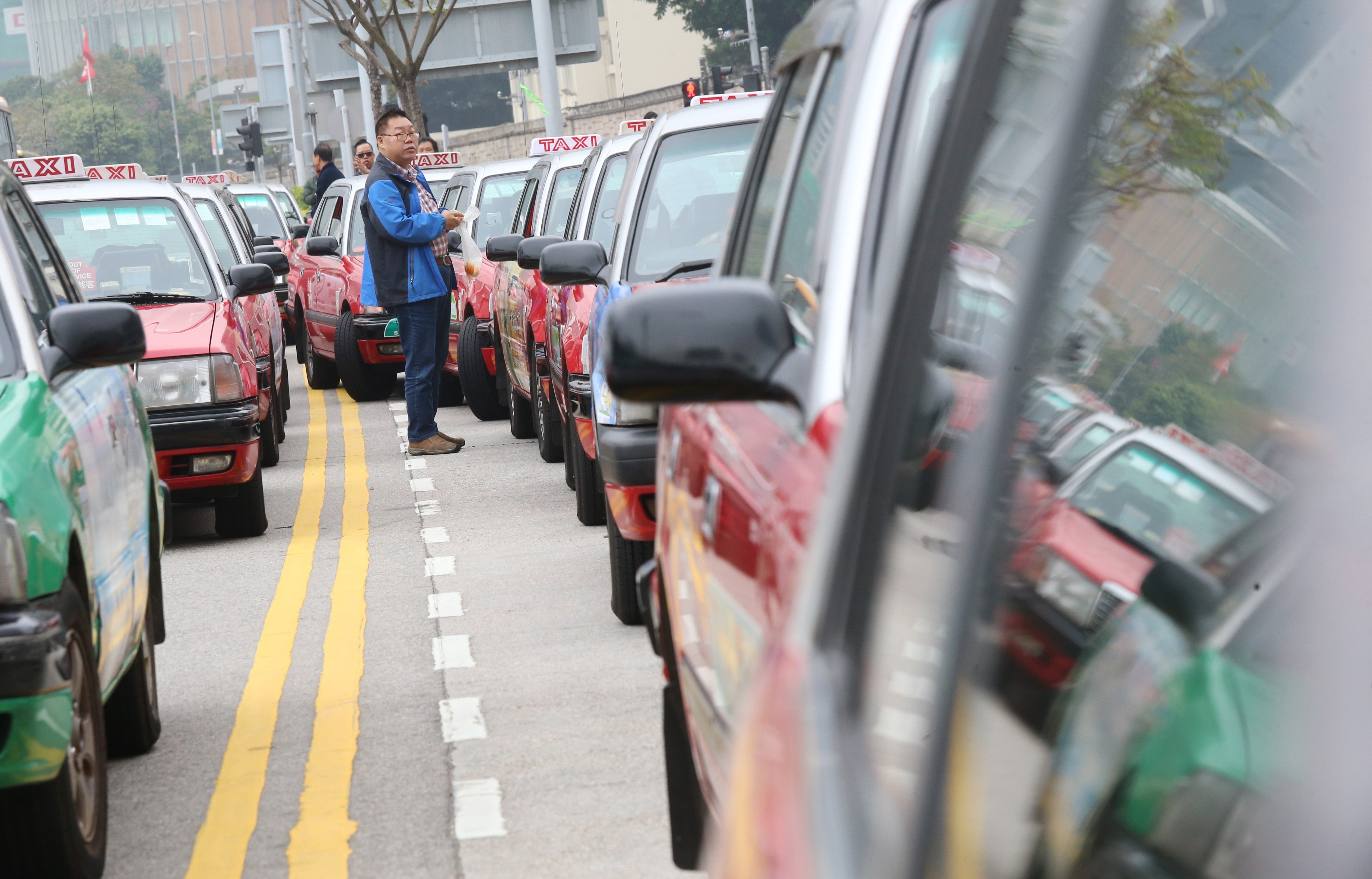 More than half of Hong Kong’s 18,000 taxis are more than seven years old, according to the Transport Department.  Photo: Dickson Lee