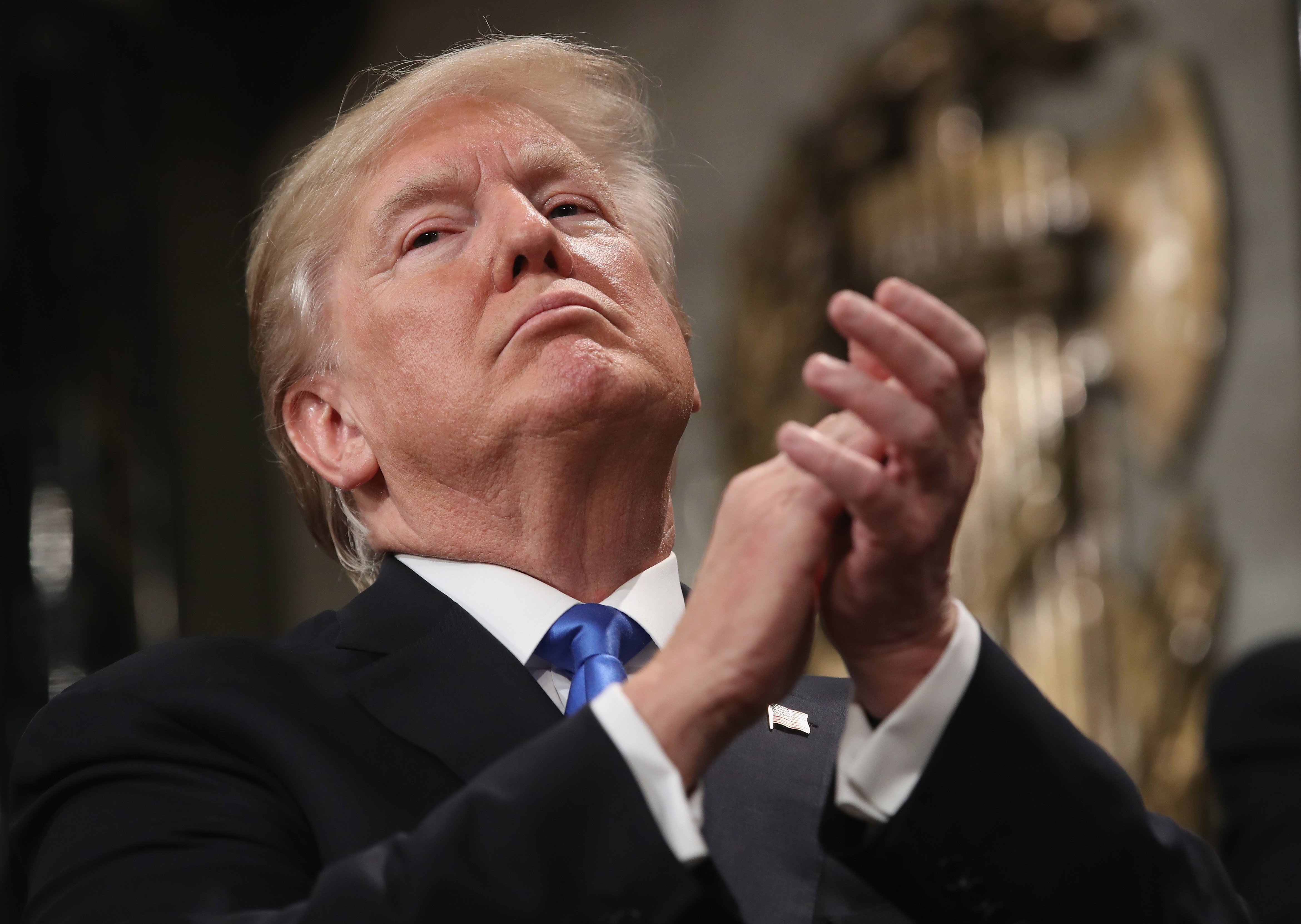 US President Donald Trump claps after finishing his first State of the Union address on January 30. Since delivering his unifying message, Trump’s decision to release a memo accusing the FBI and the Department of Justice of misconduct has widened the divide between the Republicans and the Democrats. Photo: EPA-EFE