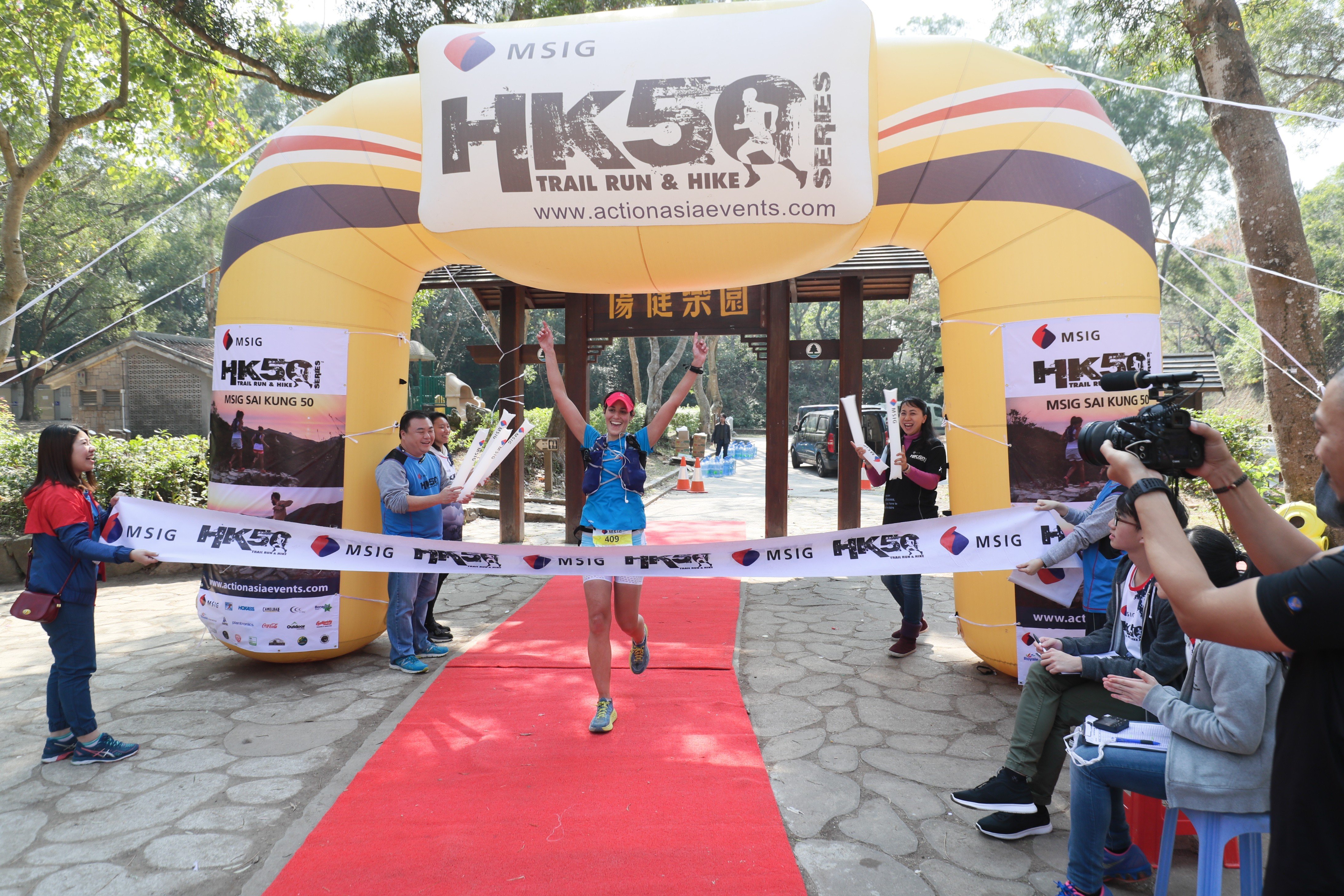 Nia Cooper crossing the finish line of the Sai Kung 50 2018. Photos: Action Asia