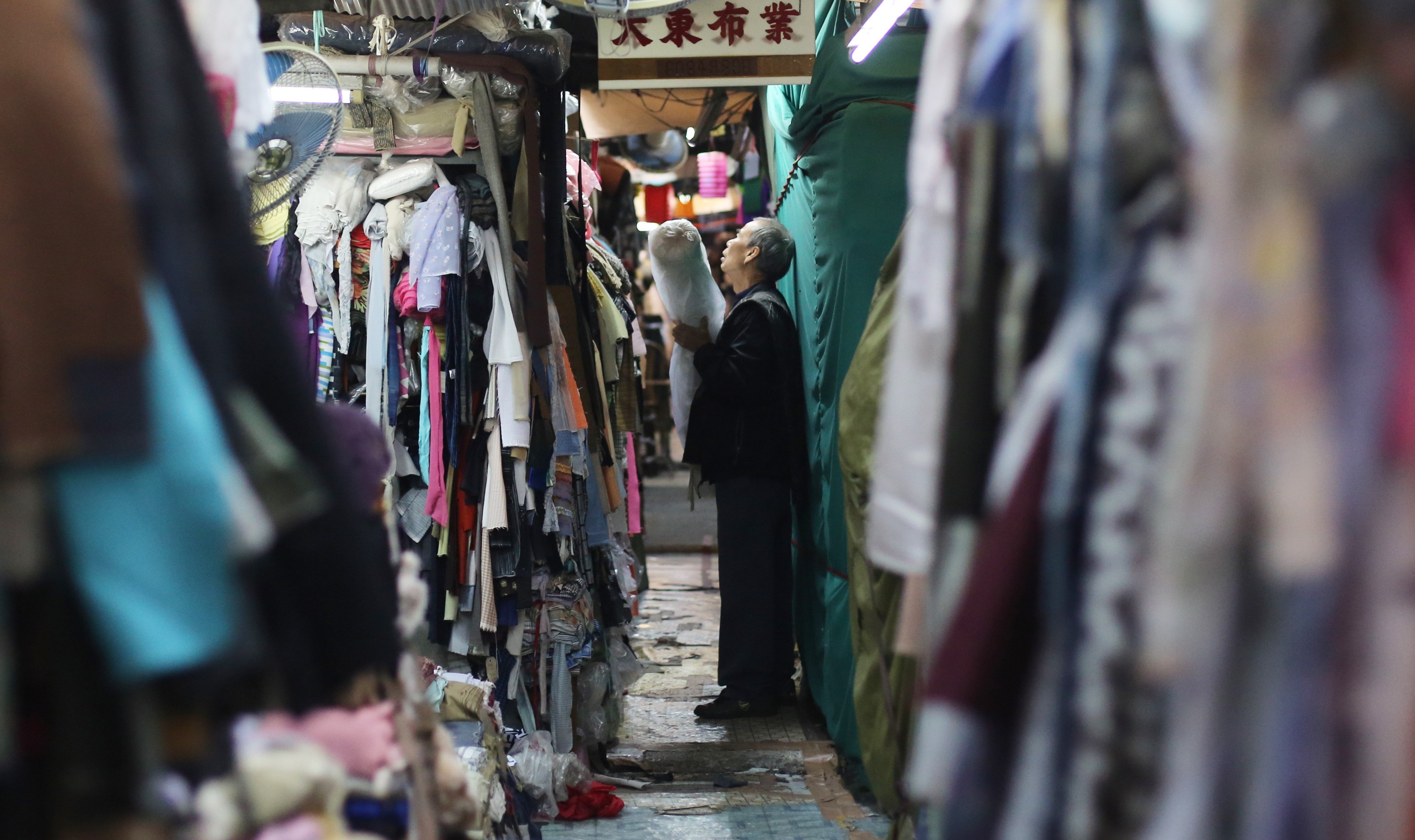 Fabric vendors and customers have long flocked to Hong Kong’s Sham Shui Po district. Photo: Sam Tsang