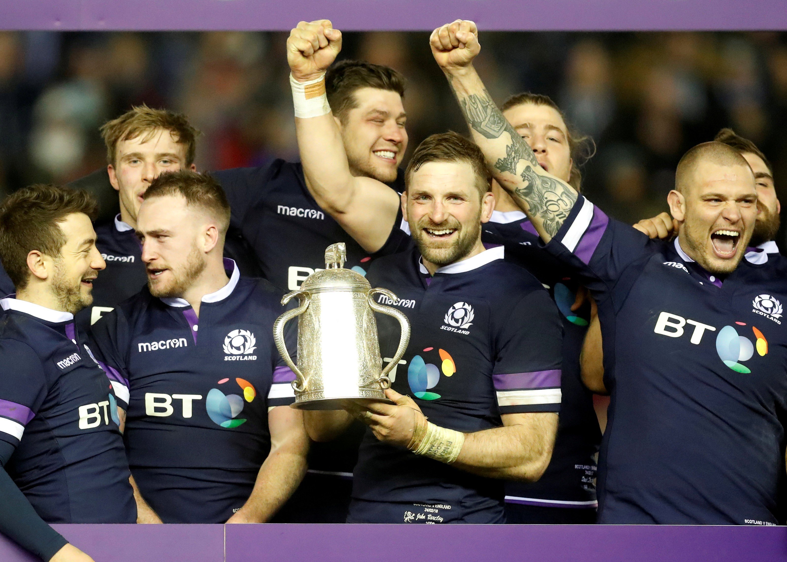 Scotland’s John Barclay celebrates with teammates and the Calcutta Cup trophy after the win over England. Photo: Reuters
