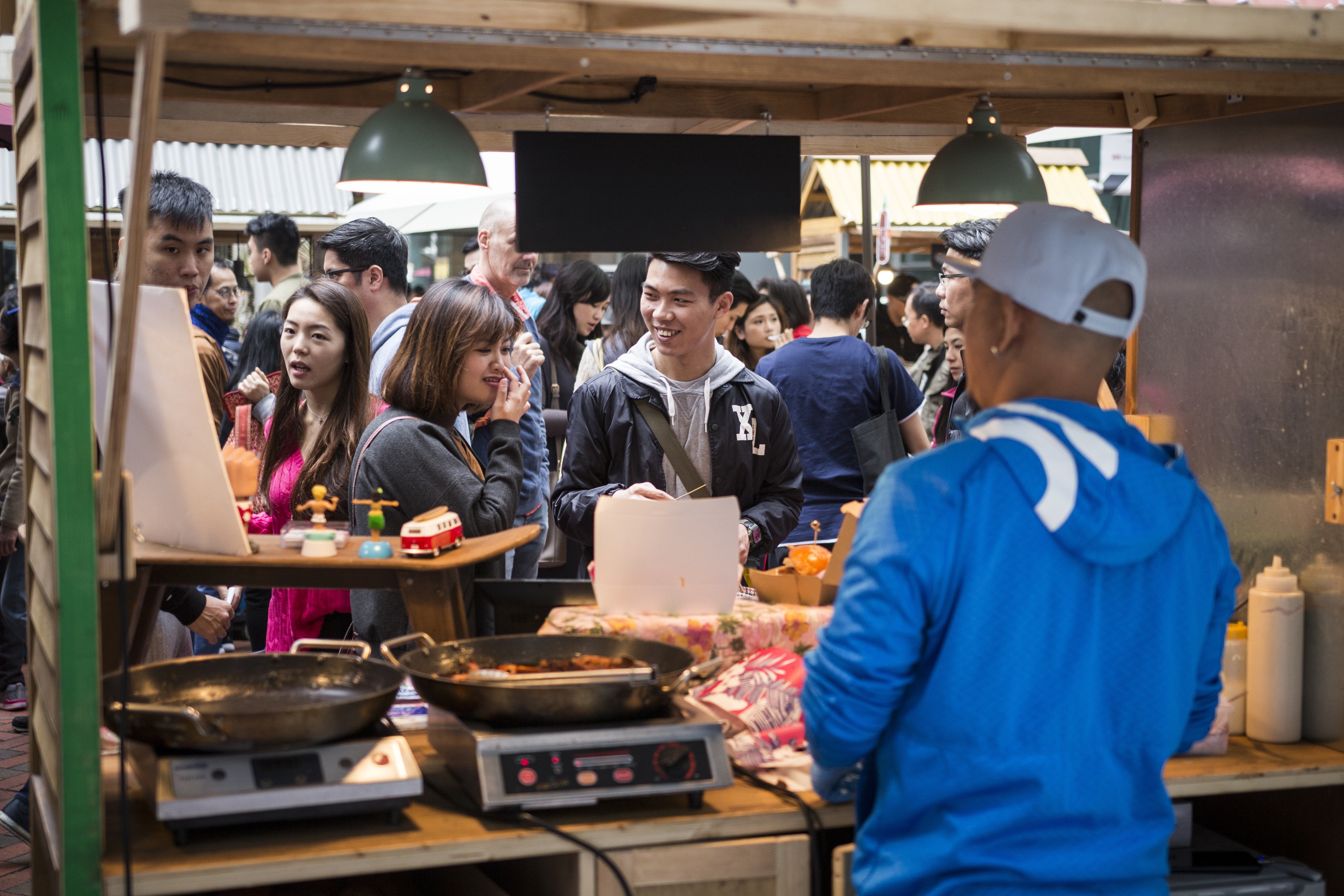 A street market in Quarry Bay. When asked what the city had to offer expats, 36 per cent of Hong Kong respondents cited the quality of food. Photo: Christopher DeWolf