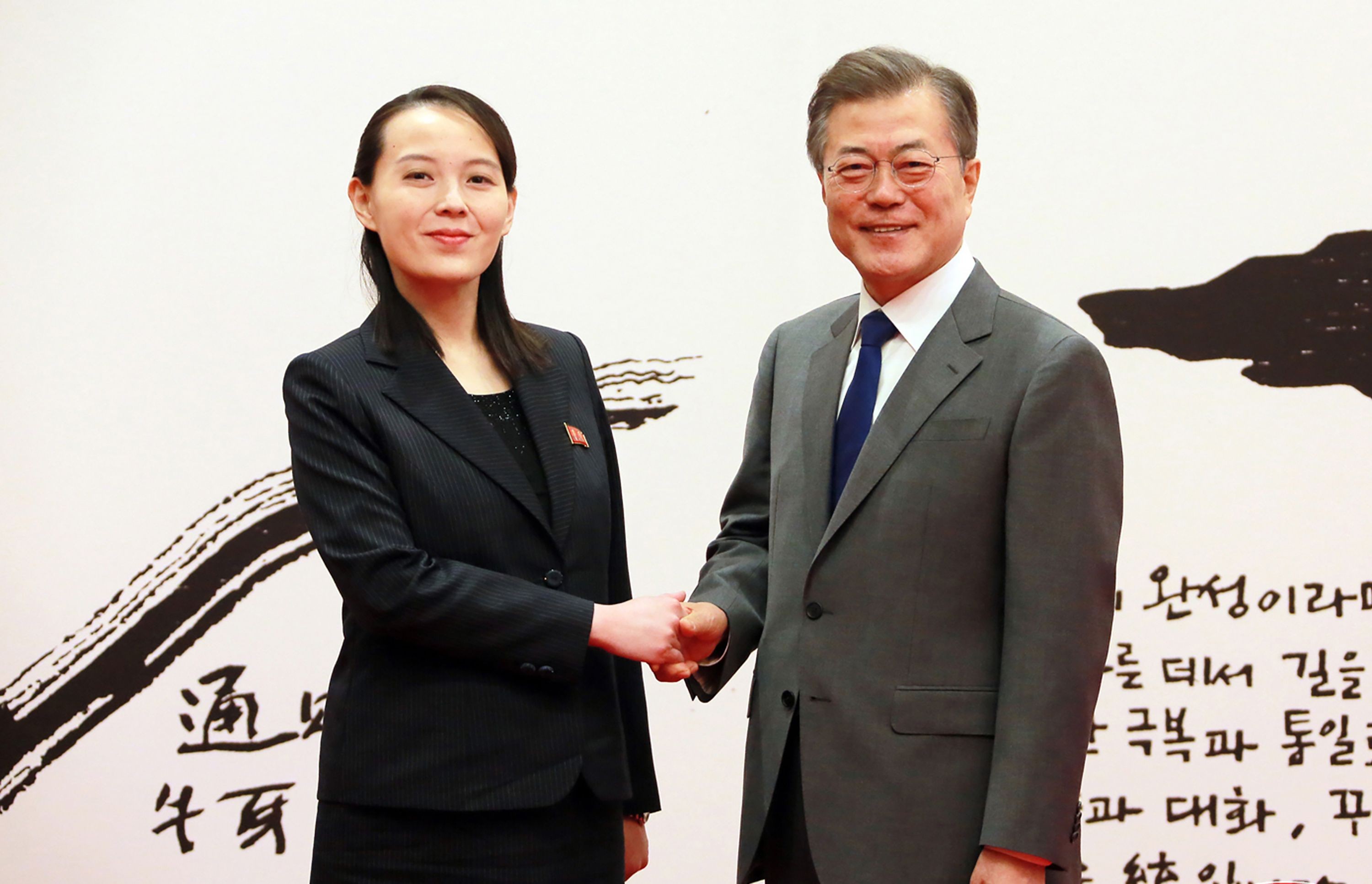 This photo, taken on February 10, 2018 and released February 11 by North Korea's official Korean Central News Agency (KCNA), shows South Korea's President Moon Jae-in posing with North Korean leader Kim Jong-un's sister Kim Yo-jong before their meeting at the presidential Blue House in Seoul. File photo: KCNA via KNS/AFP