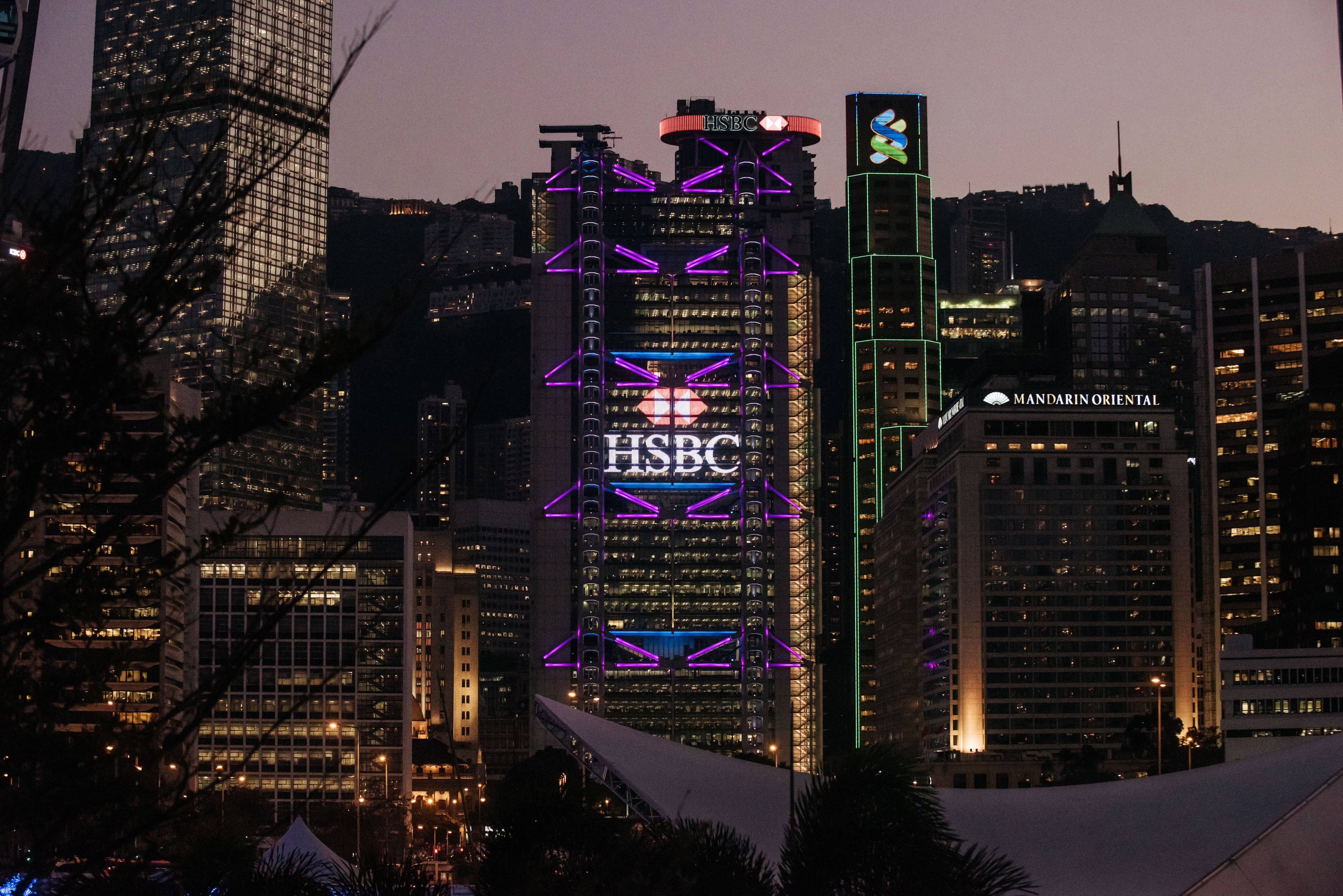 The HSBC and Standard Chartered buildings in Hong Kong, the largest market by revenue for both banks. Photo: Bloomberg