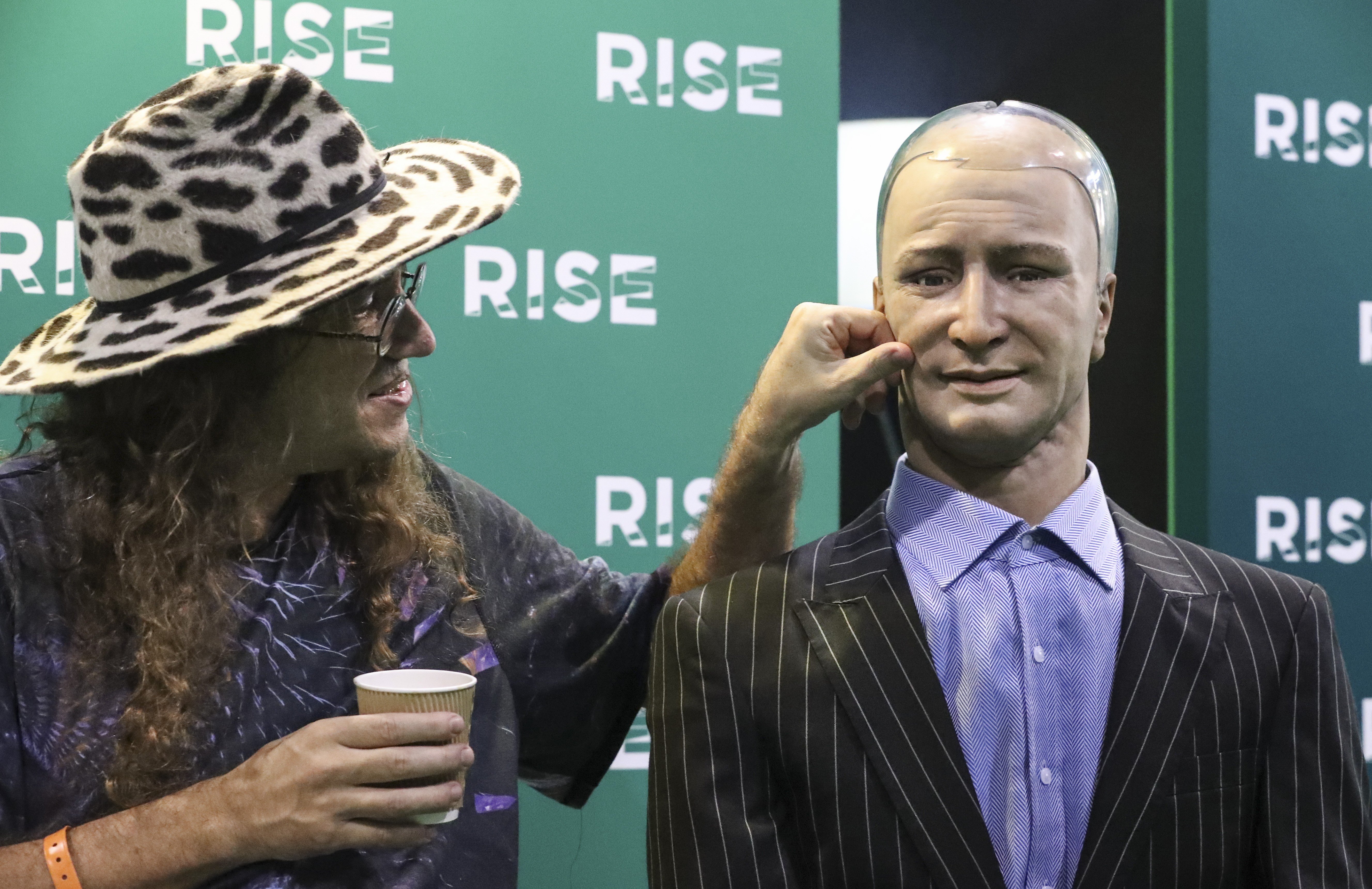 Ben Goertzel, chief scientist at Hong Kong Science Park-based Hanson Robotics, presents Han the robot at a conference in July 2017. The Science Park will administer HK$40 billion of the funding allocated to the promotion of innovation and technology in the budget. Photo: Nora Tam