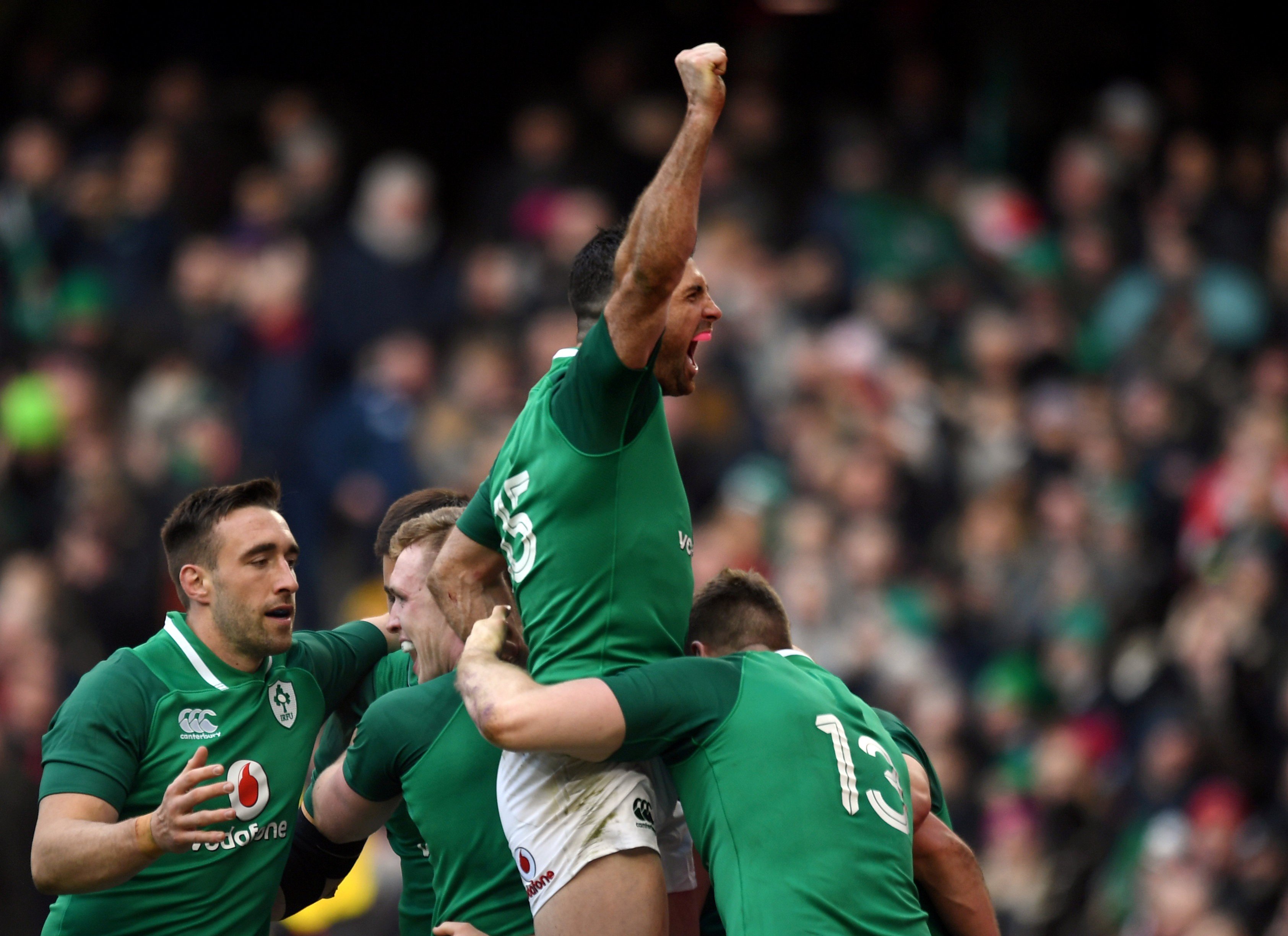 Ireland’s Rob Kearney celebrates with teammates after their fifth try against Wales. Photo: Reuters