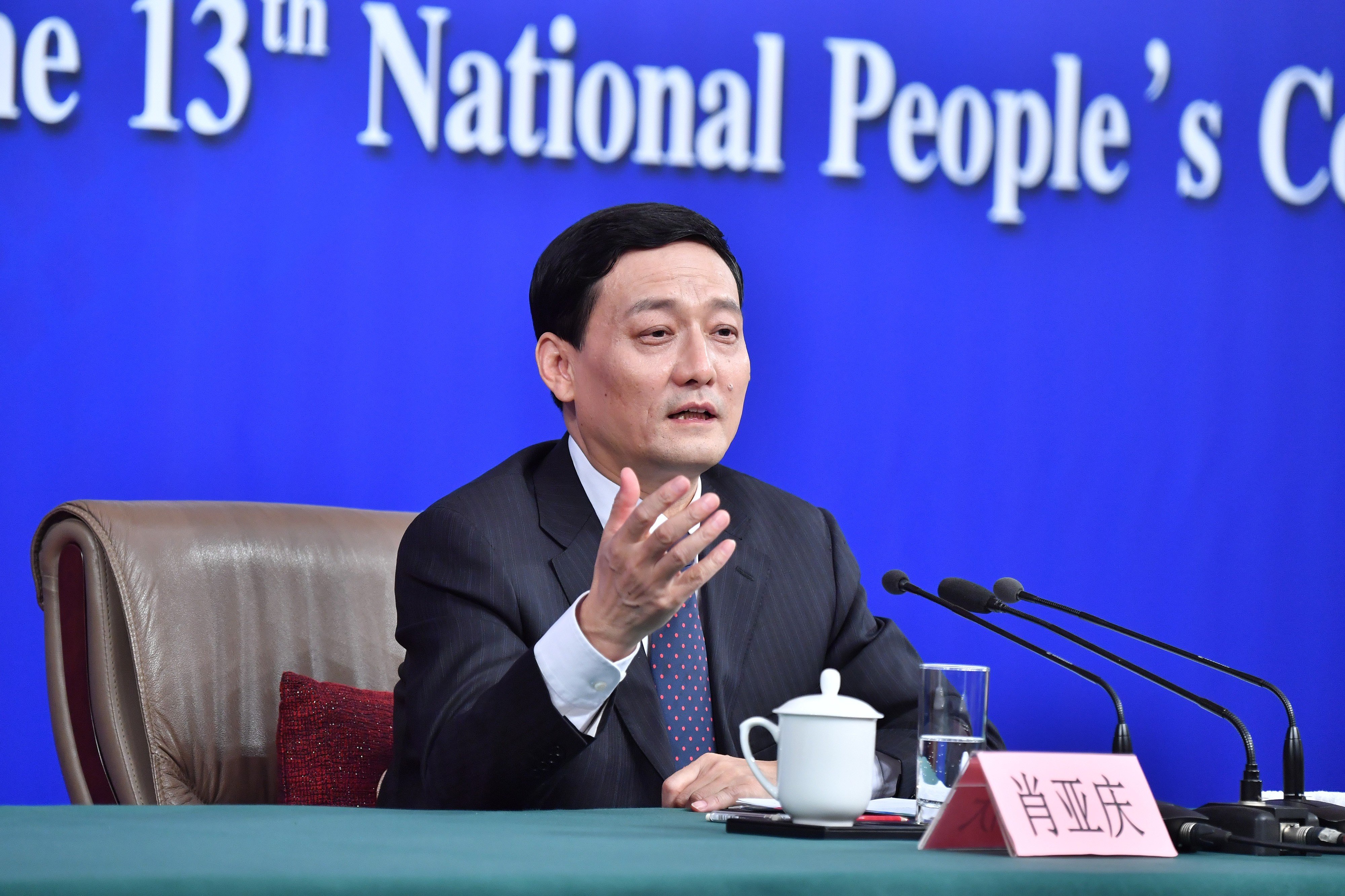 Sasac chief Xiao Yaqing says the regulator will use various means to cut debt ratios. Photo: Xinhua