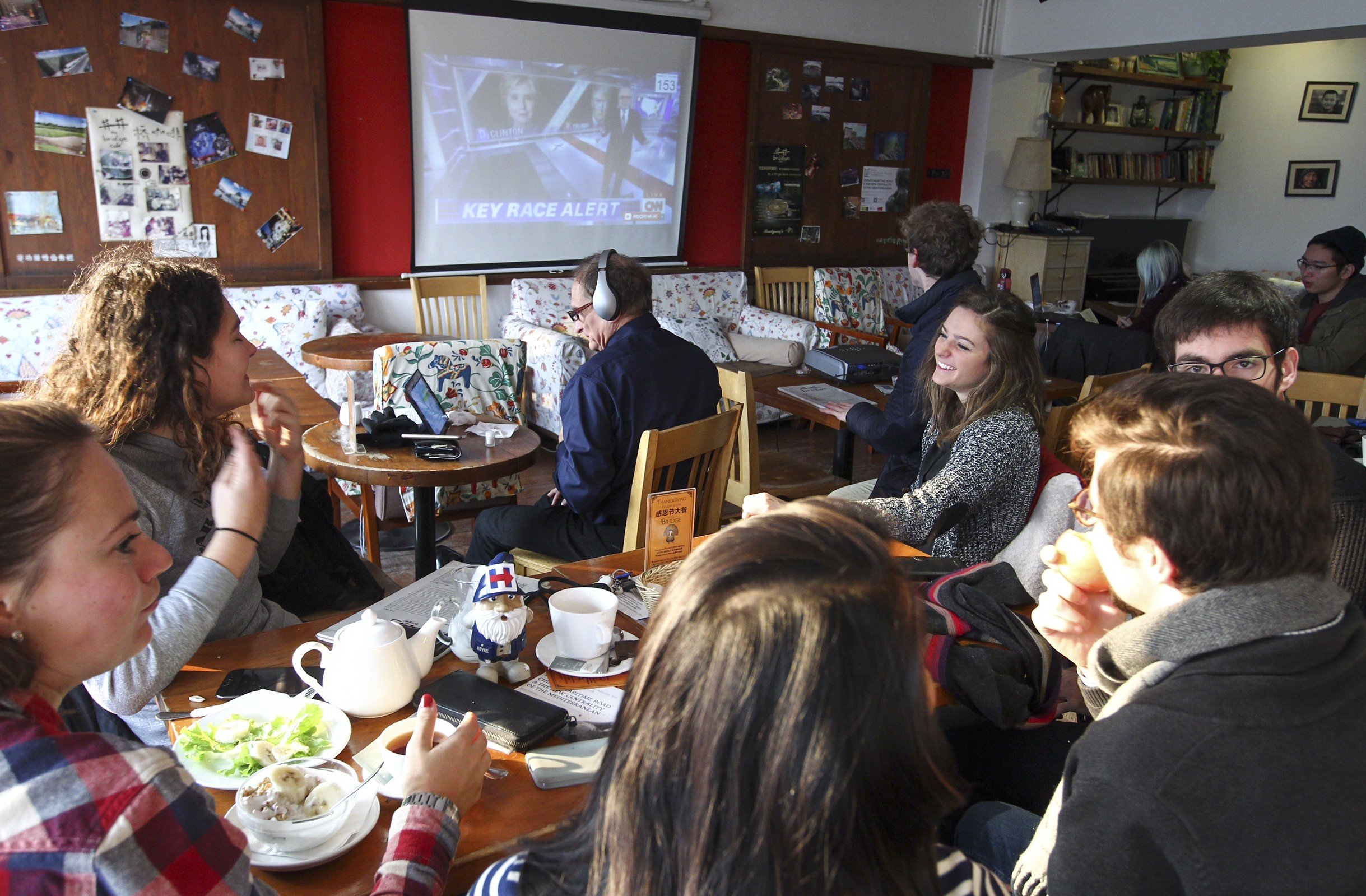 Foreigners watch a live broadcast of the US election at a cafe in Beijing in November 2016. Beijing recently banned foreigners gathering in groups of 10 or more at restaurants in its university district during China’s annual parliamentary meetings. Photo: Simon Song