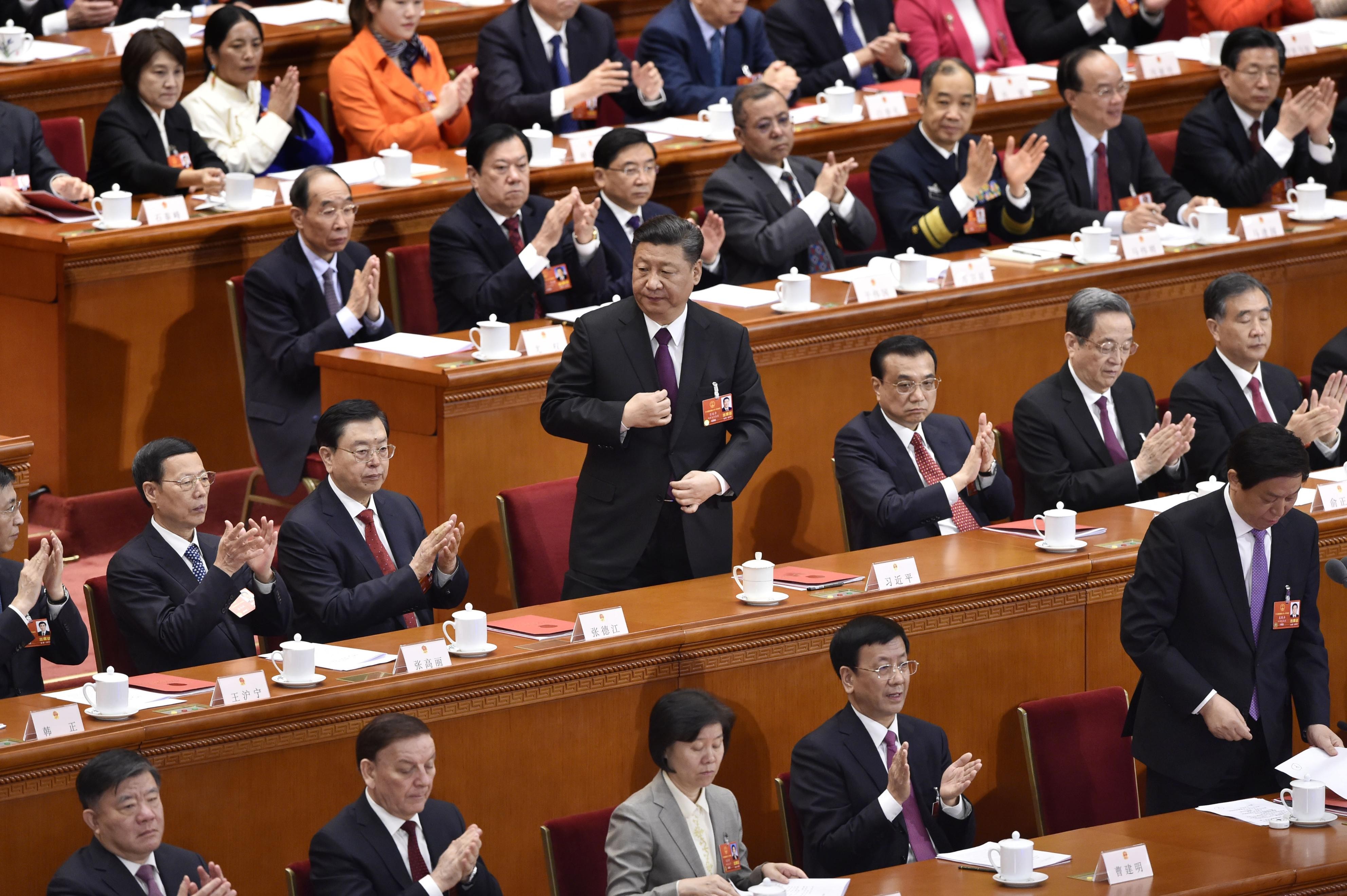 Xi Jinping (centre) sent a strong nationalist message in his closing speech to the National People’s Congress on Tuesday. Photo: Kyodo