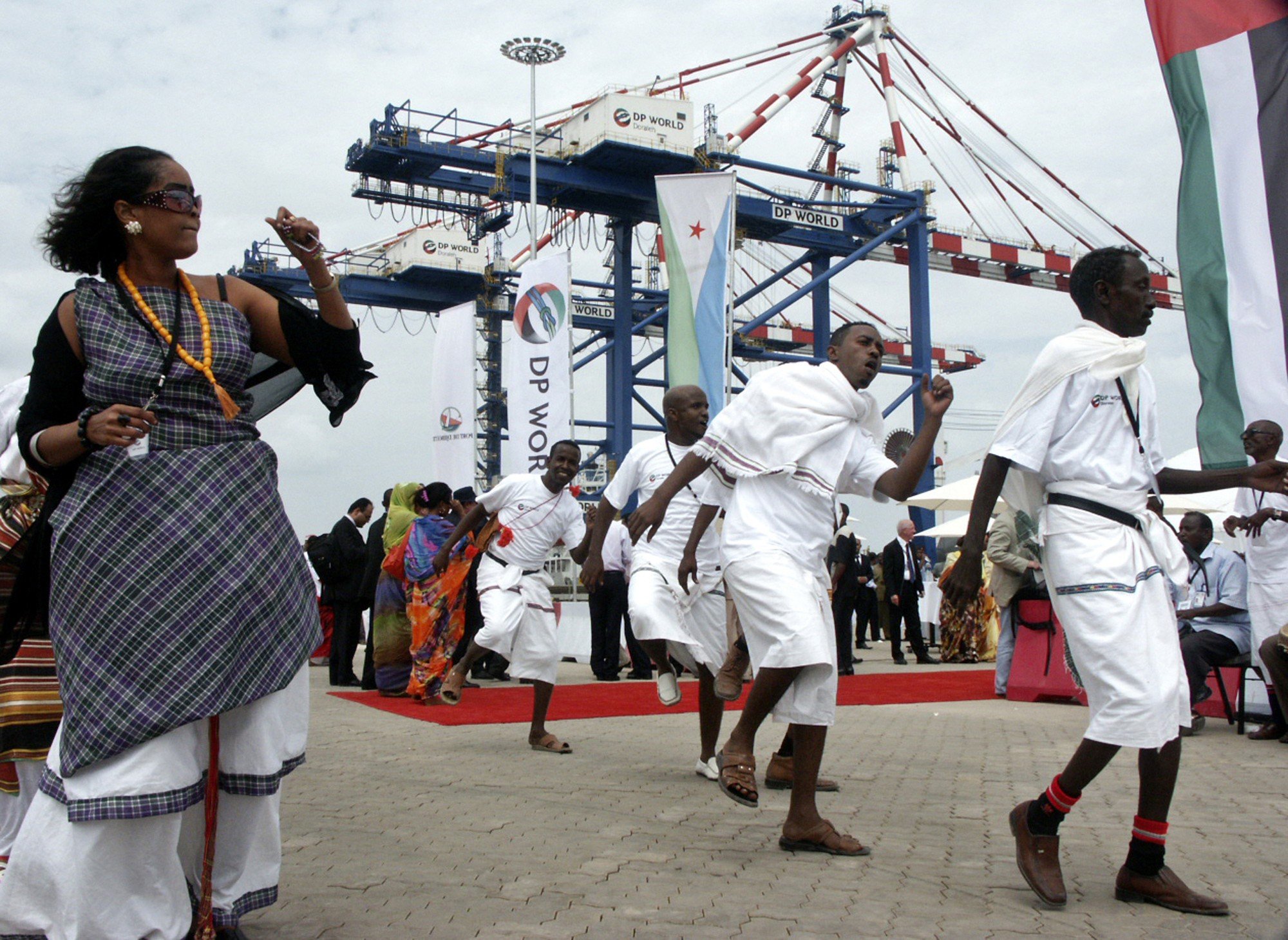 Performers dance during the opening ceremony of Dubai-based port operator DP World’s Doraleh container terminal in Djibouti port. Djibouti’s president has been criticised for seizing control of the terminal, reportedly to allow China to take it over. China has been investing heavily in the African port nation and set up a naval base there. Photo: AP