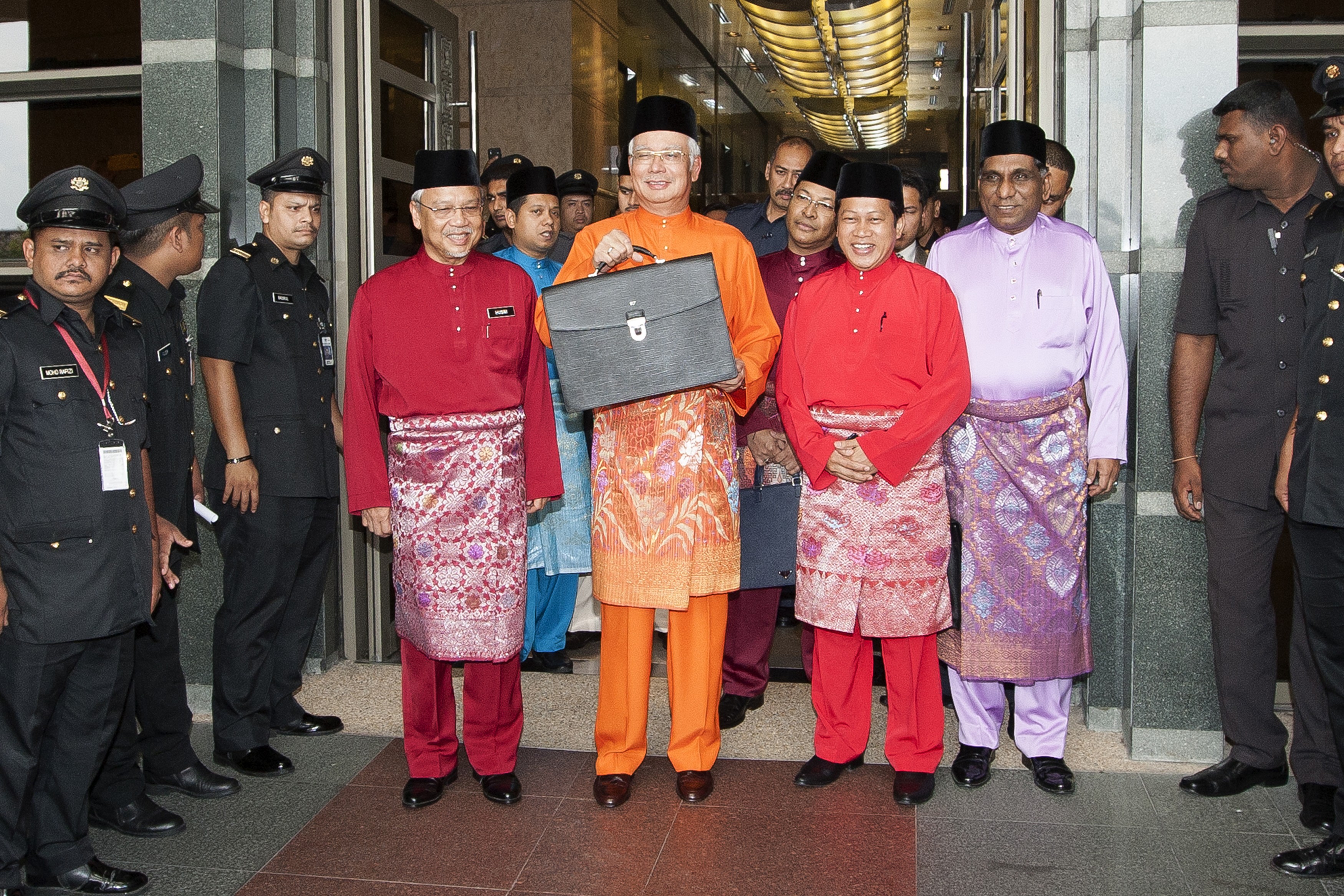 Malaysian PM Najib Razak with his budget briefcase. Photo: AFP