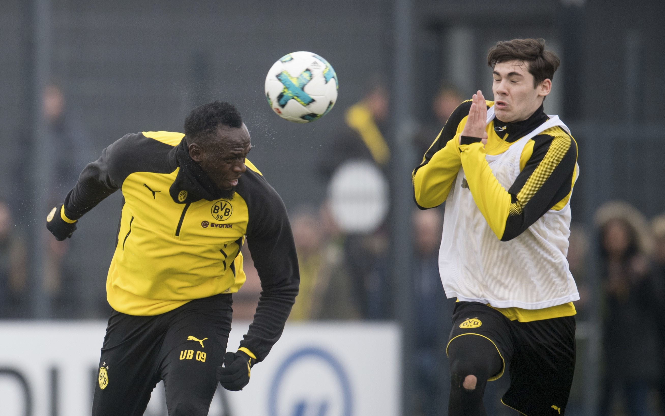 Jamaica’s former sprinter Usain Bolt heads the ball during a practice session with the Borussia Dortmund soccer squad. Photo: AP