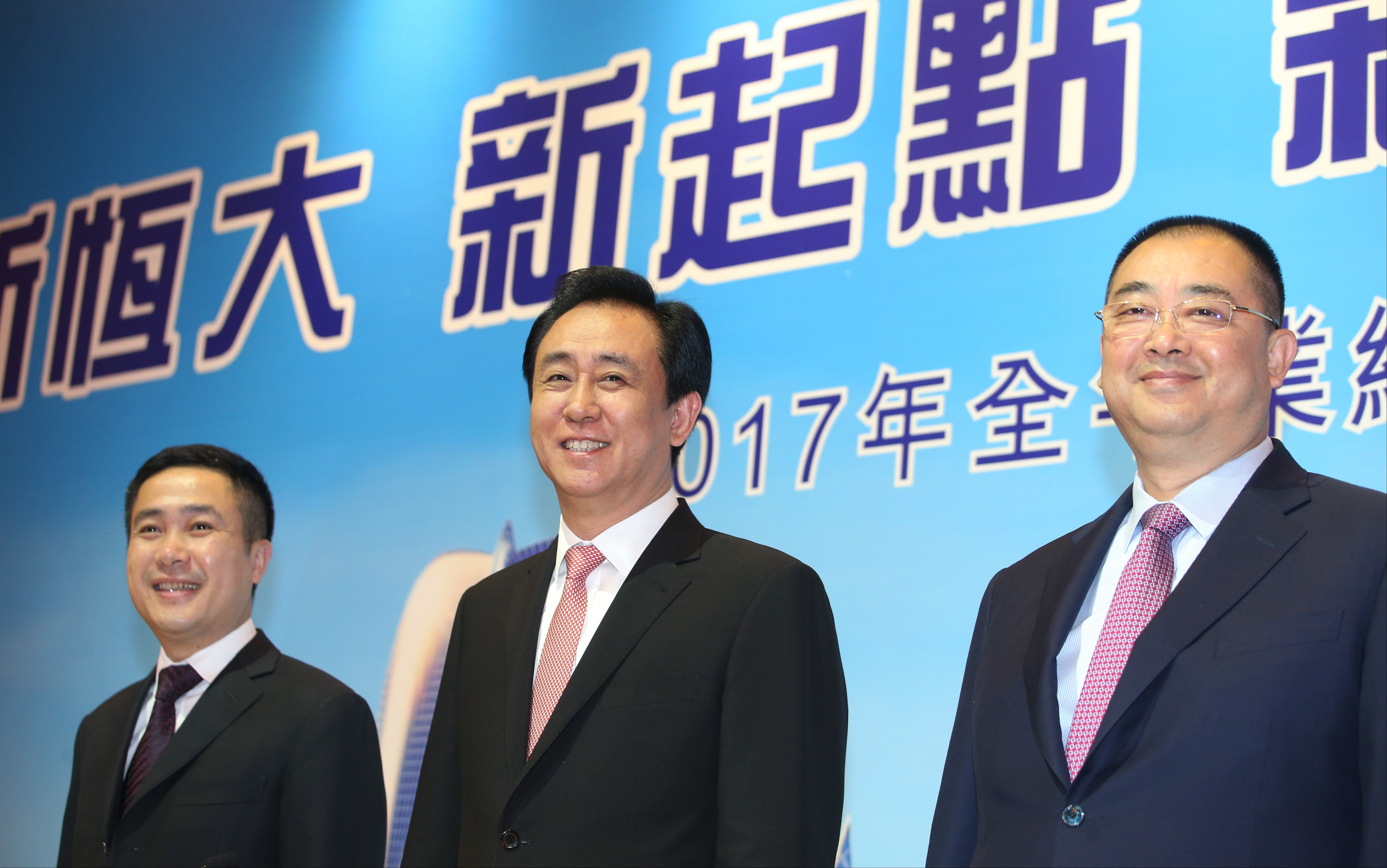 From left, Pan Darong, the executive director and CFO of China Evergrande Group, Hui Ka-yan, Evergrande’s chairman, and Xia Haijun, the company’s vice-chairman and CEO, during the release of the developer’s annual result in Hong Kong on Monday. Photo: David Wong