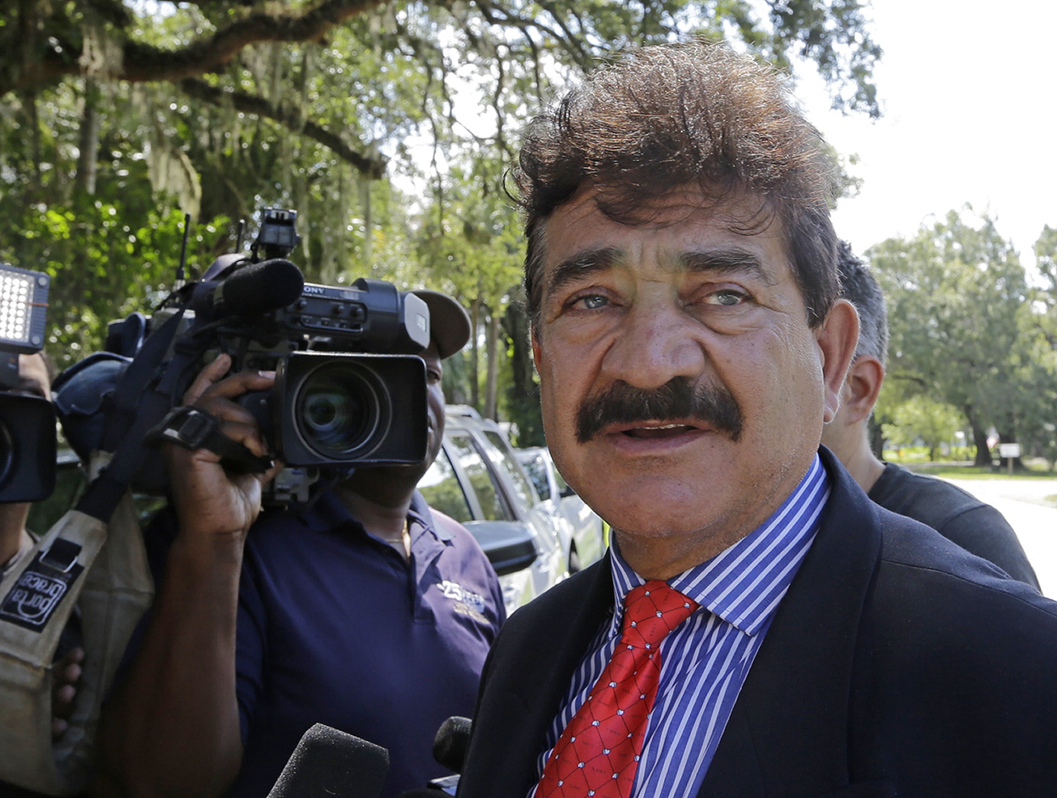 Seddique Mir Mateen, father of Omar Mateen, the shooter of the Pulse nightclub attack, talks to reporters in Fort Pierce, Fla. on June 15, 2016.