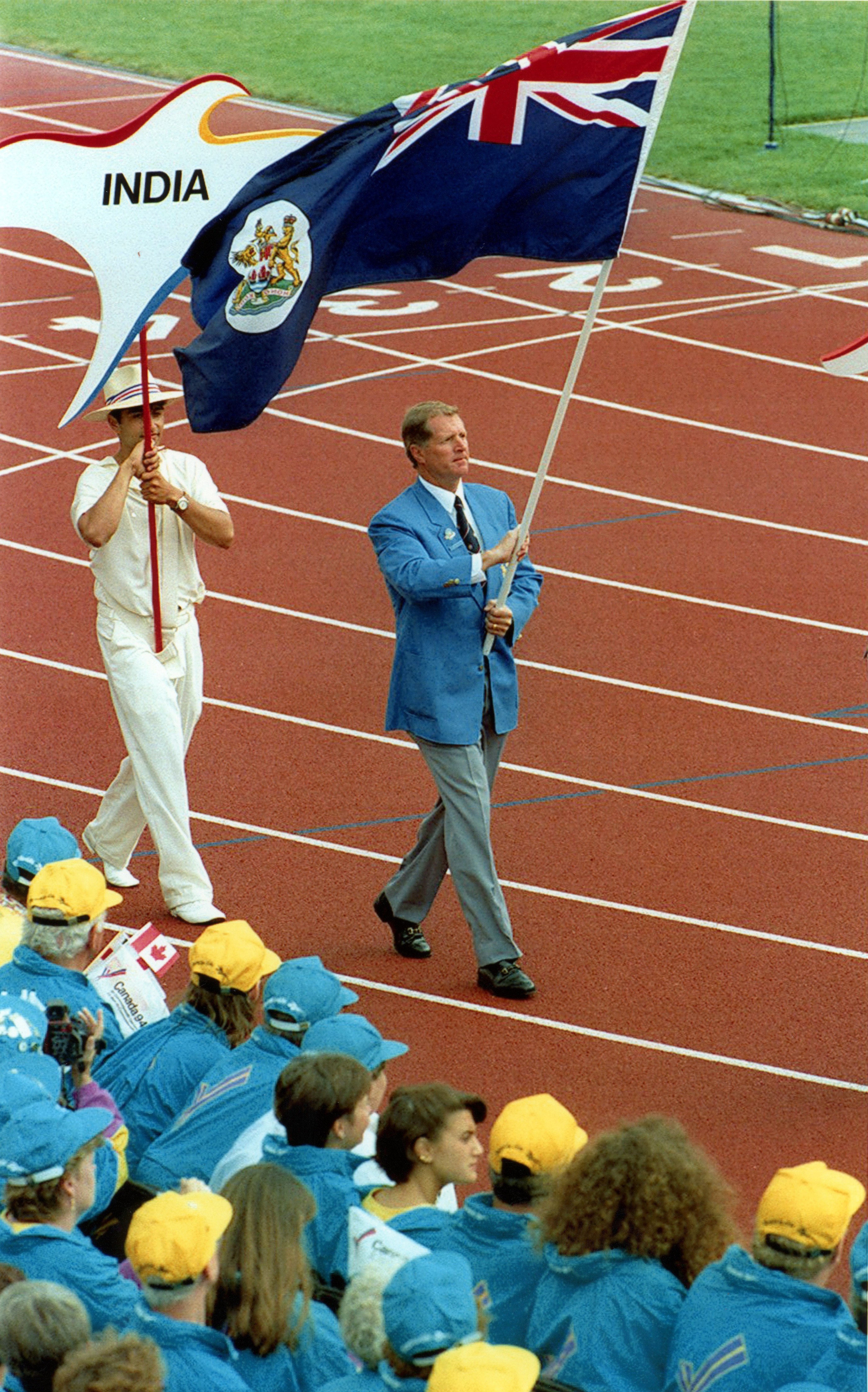 Ken Wallis is Hong Kong’s flag-bearer at the closing ceremony of their last Commonwealth Games in 1994 in Victoria, Canada. Photo: Robert Ng