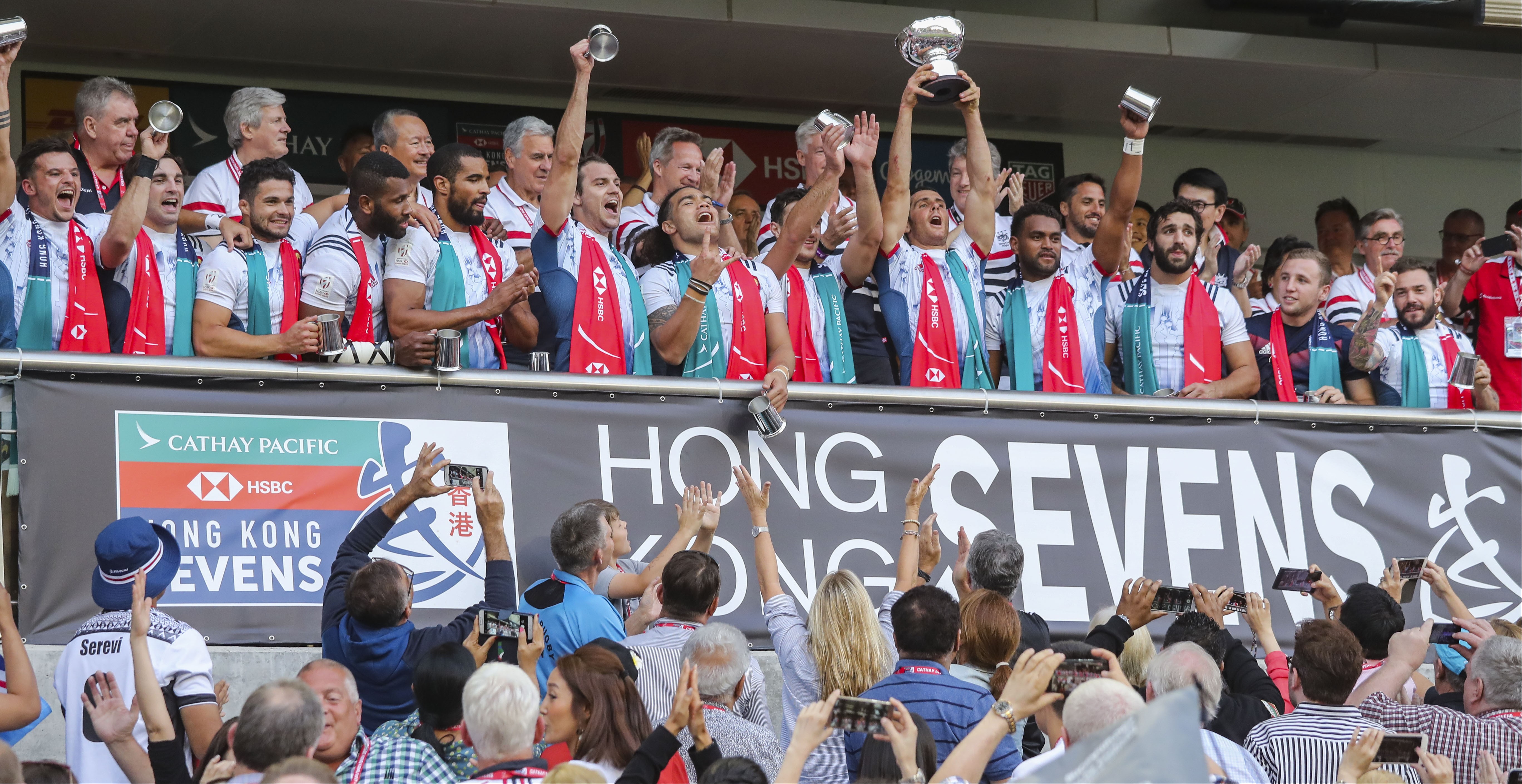 France celebrate at the trophy presentation after beating Canada in the Bowl final in Hong Kong. Photo: K.Y. Cheng