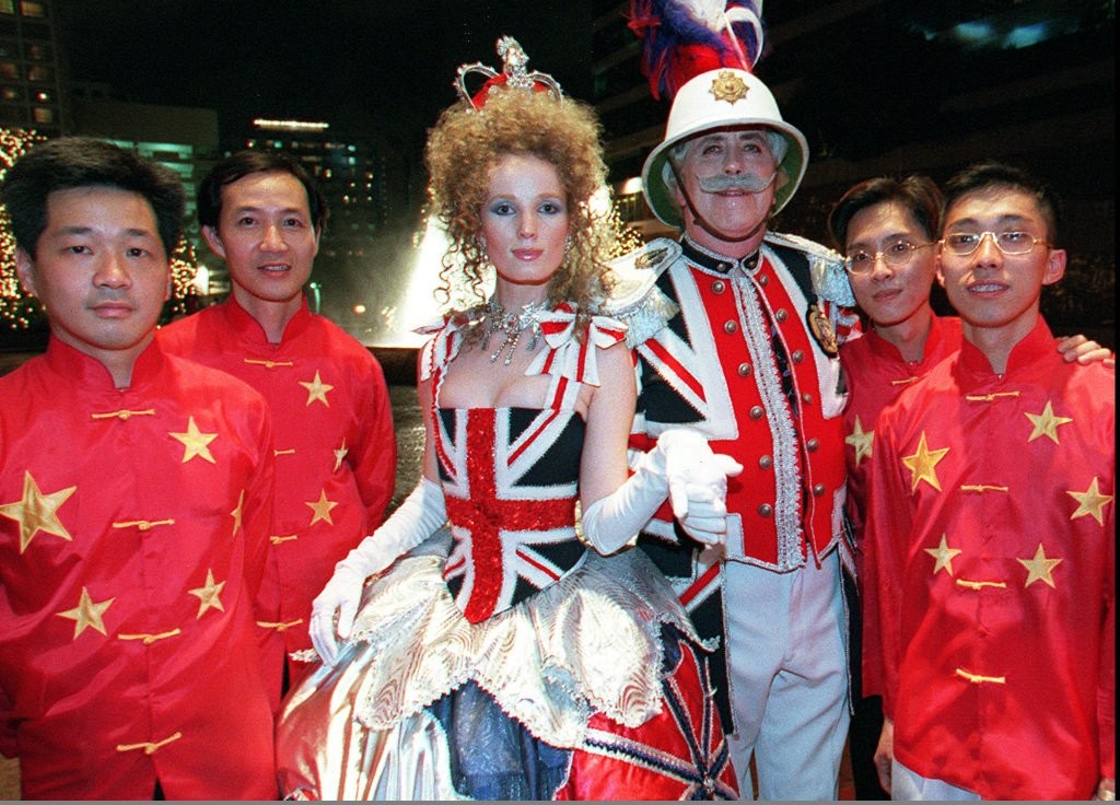 Revellers dressed in the British and Chinese national colours, at a handover party in Kowloon, on July 1, 1997. Photo: AFP