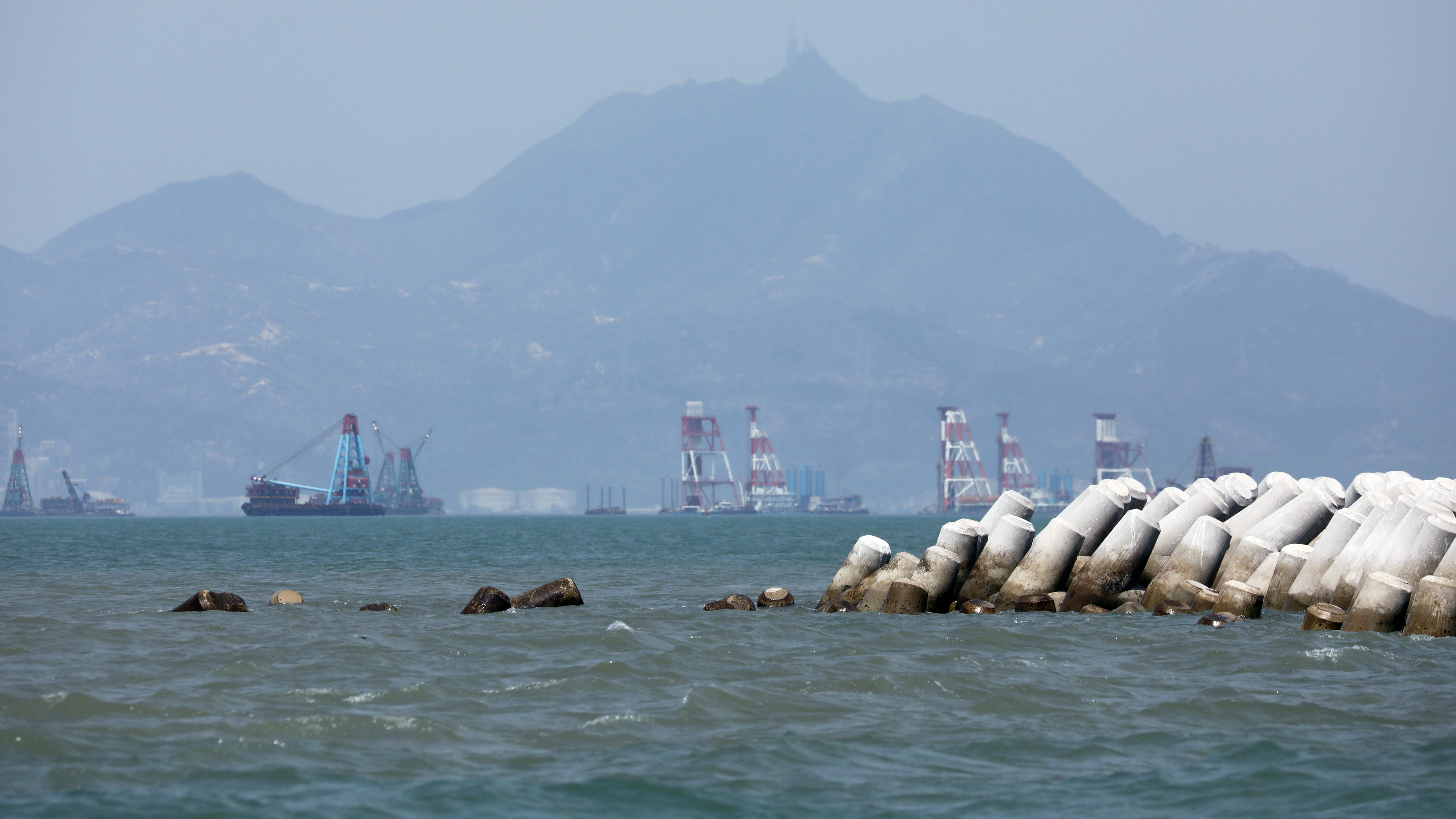 Concrete tetrapods, supposed to protect the edges of an artificial island that is part of the Hong Kong-Zhuhai-Macau bridge project, appear to have been collapsing and drifting away. Photo: May Tse