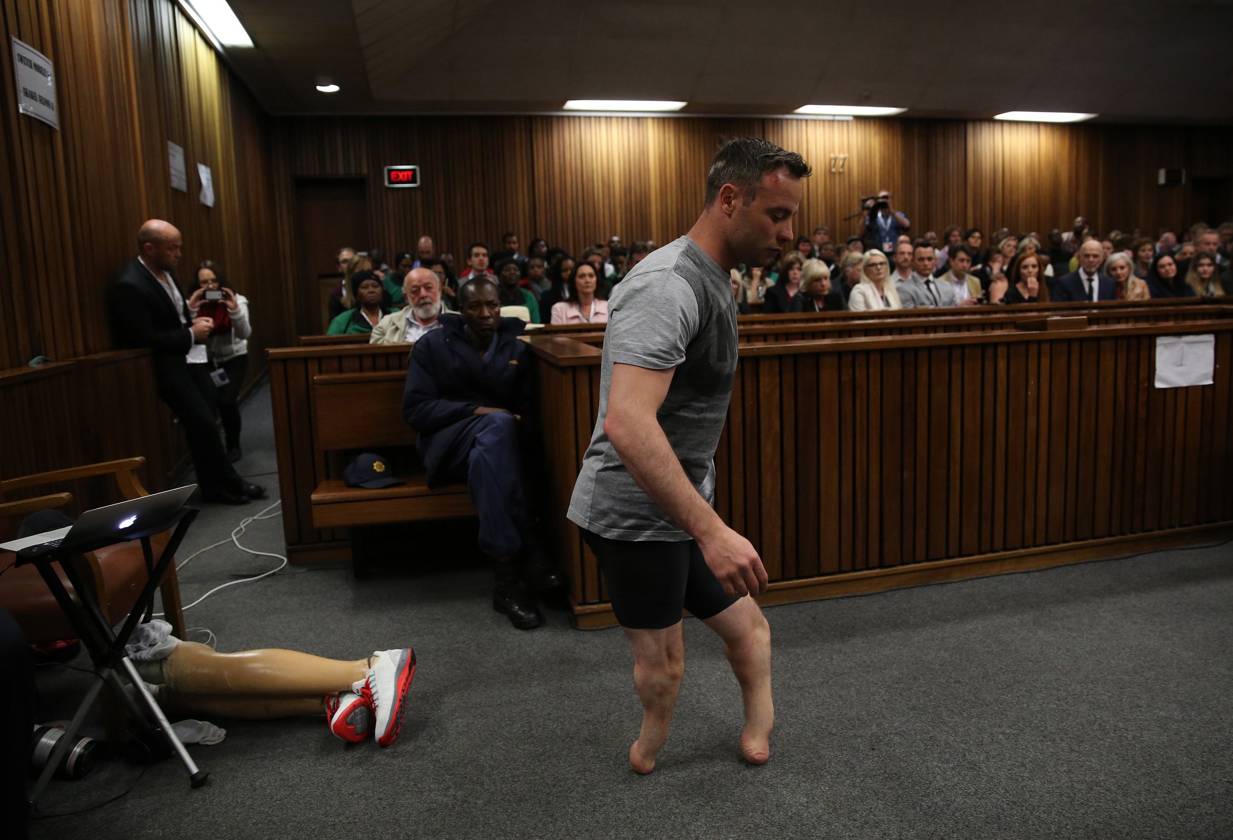 Oscar Pistorius' prosthetics lay on the floor as he walks on his stumps during argument in mitigation of sentence by his defense attorney Barry Roux in the High Court in Pretoria, South Africa, in June 2016. He has now lost his final appeal against his conviction for murdering his girlfriend, Reeva Steenkamp. Photo: Pool via AP