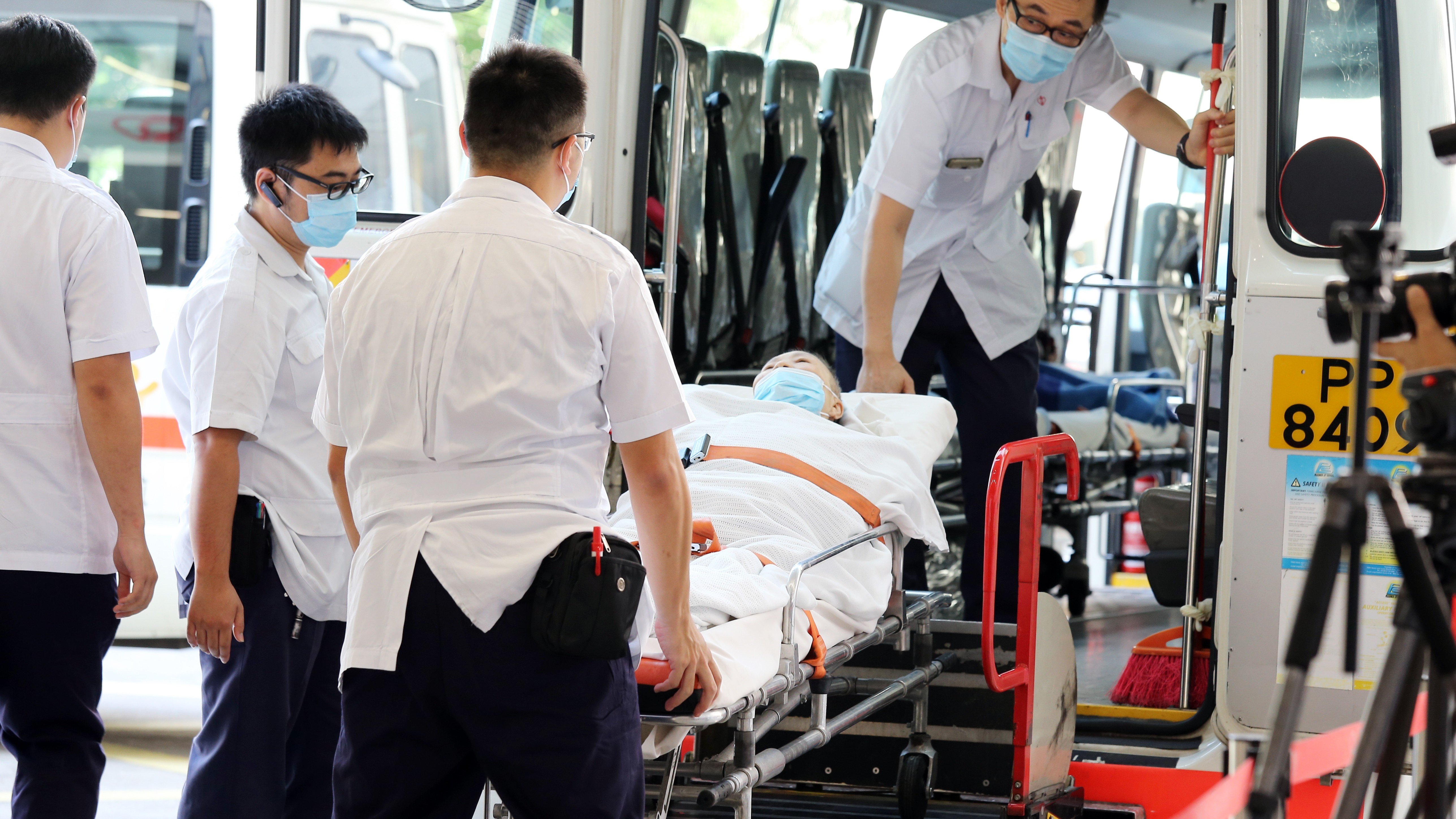 A patient is being transferred from Queen Elizabeth Hospital to St Teresa's Hospital, a private hospital in Kowloon City, in July 2017 as part of a plan to ease overcrowding in the public hospitals. Photo: Dickson Lee