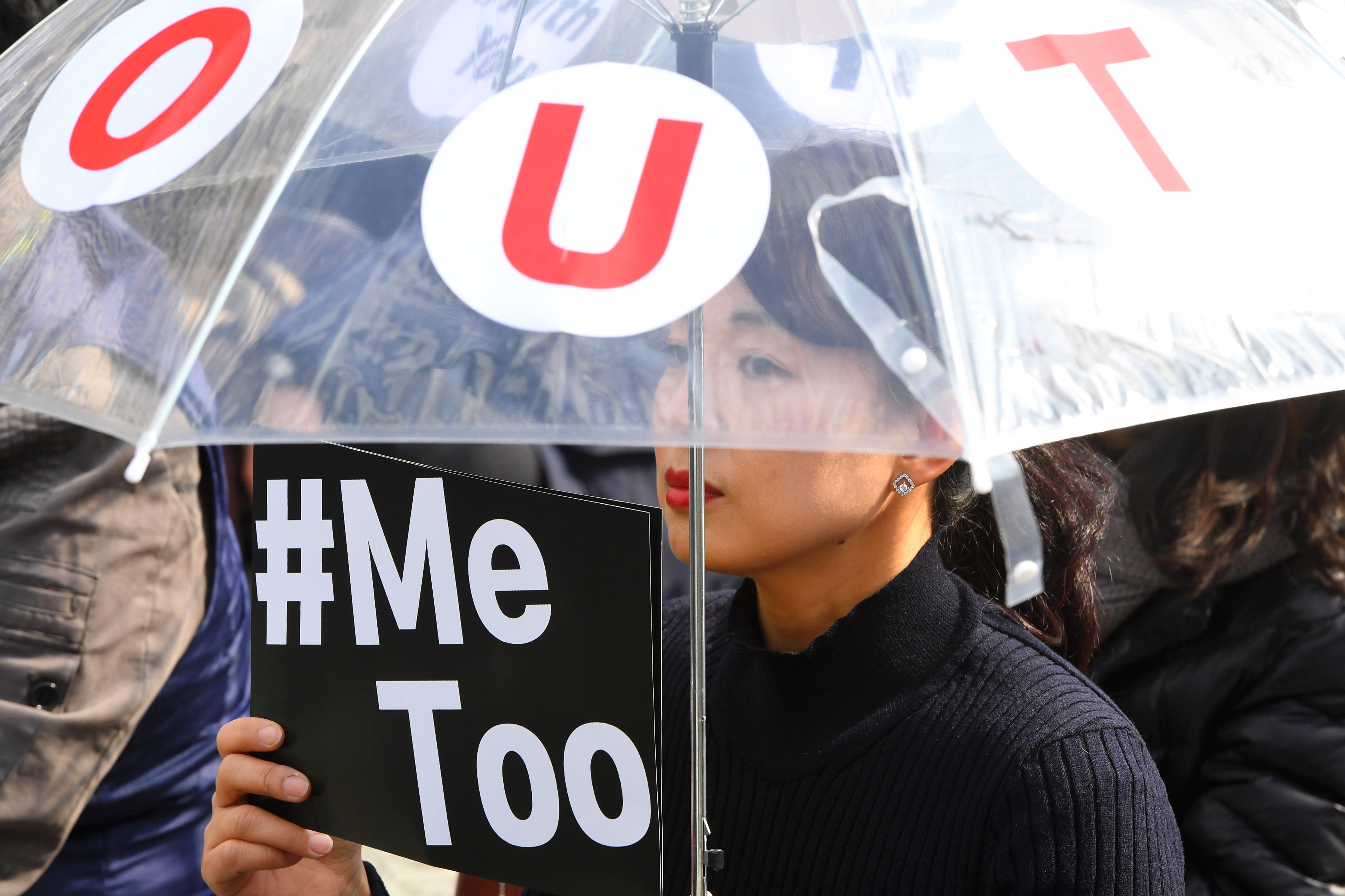 A South Korean demonstrator marks International Women’s Day. Photo: AFP