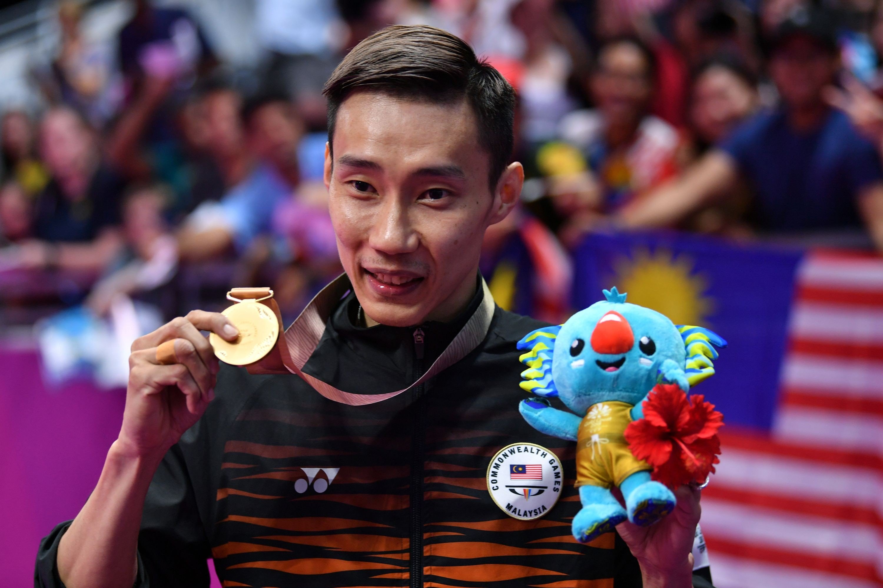 Lee Chong Wei holds his gold medal after beating India’s Srikanth Kidambi in their badminton men’s gold medal match at the 2018 Gold Coast Commonwealth Games. Photo: AFP