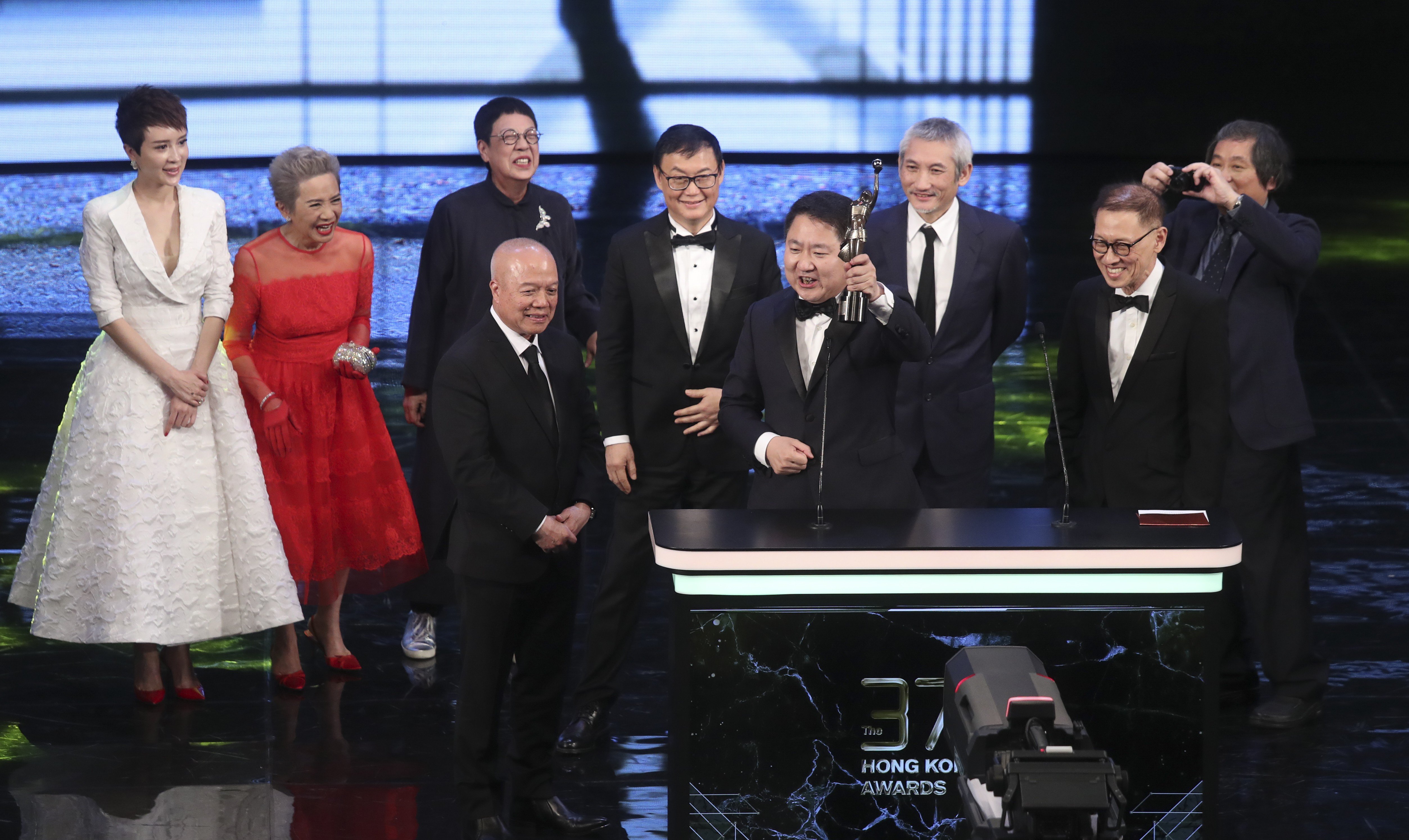 Actors, the director and the producer of Our Time Will Come react after winning Best Film. Photo: K.Y. Cheng