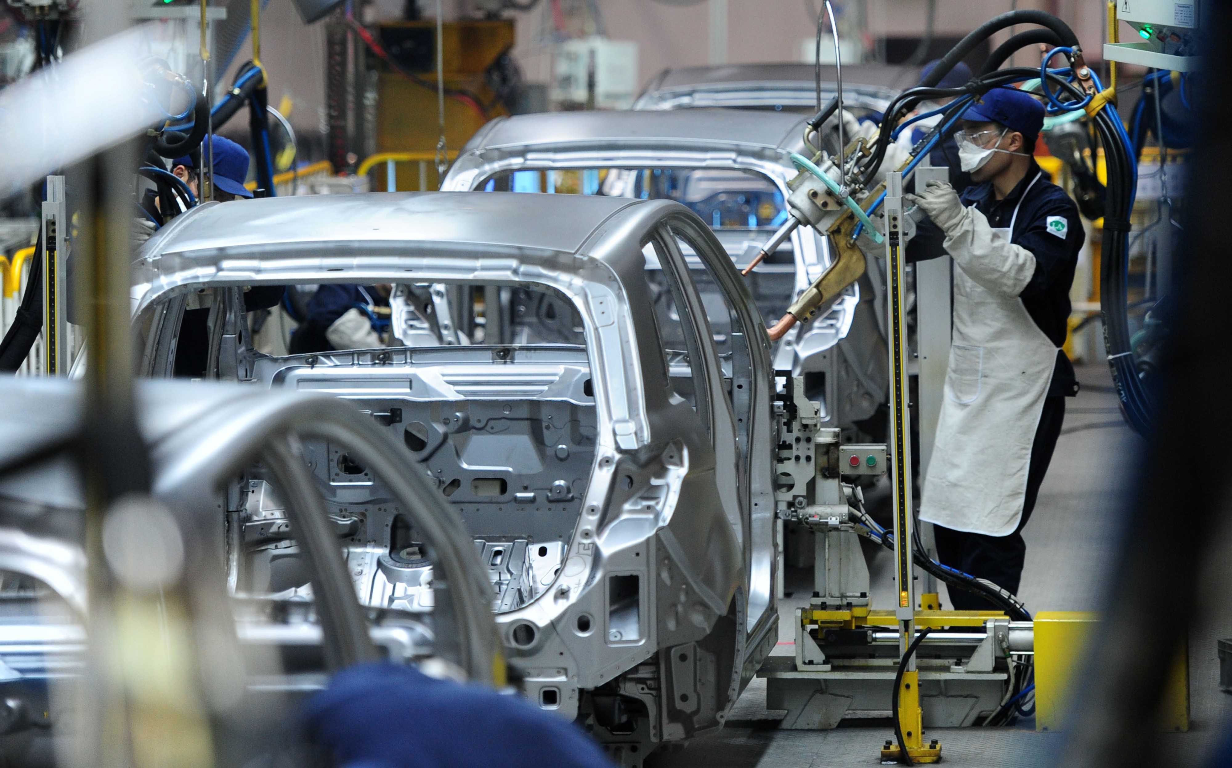 Cars are assembled at BAIC Motor’s plant in Zhuzhou, in Hunan province. On Tuesday, Beijing said it would phase out rules requiring foreign carmakers to partner with a local firm to set up a factory in China in the next five years. Photo: Imaginechina