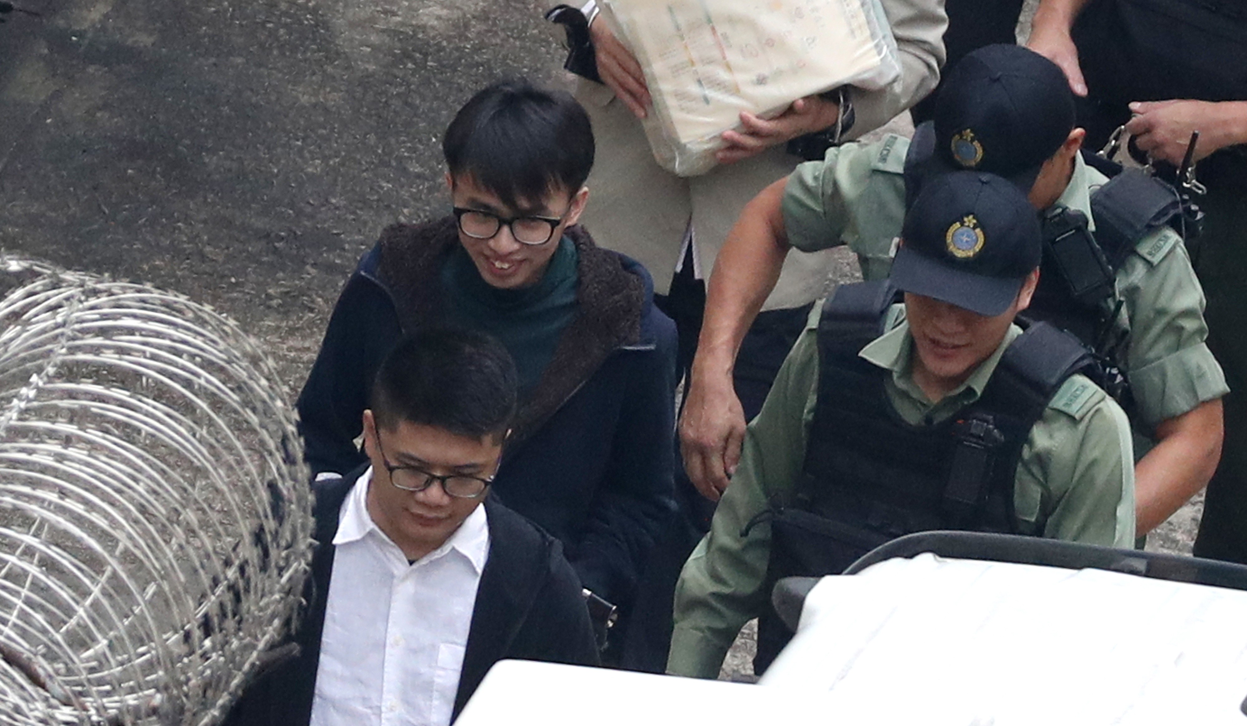Co-defendant Tsang Cheung-yan (top left) being escorted by Correctional Services Department staff on Thursday. Photo: Winson Wong