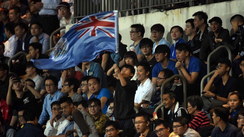 An Eastern fan waves the old British colonial flag of Hong Kong during an AFC Champions League match, at Mong Kok Stadium in February 2017. Photo: AFP