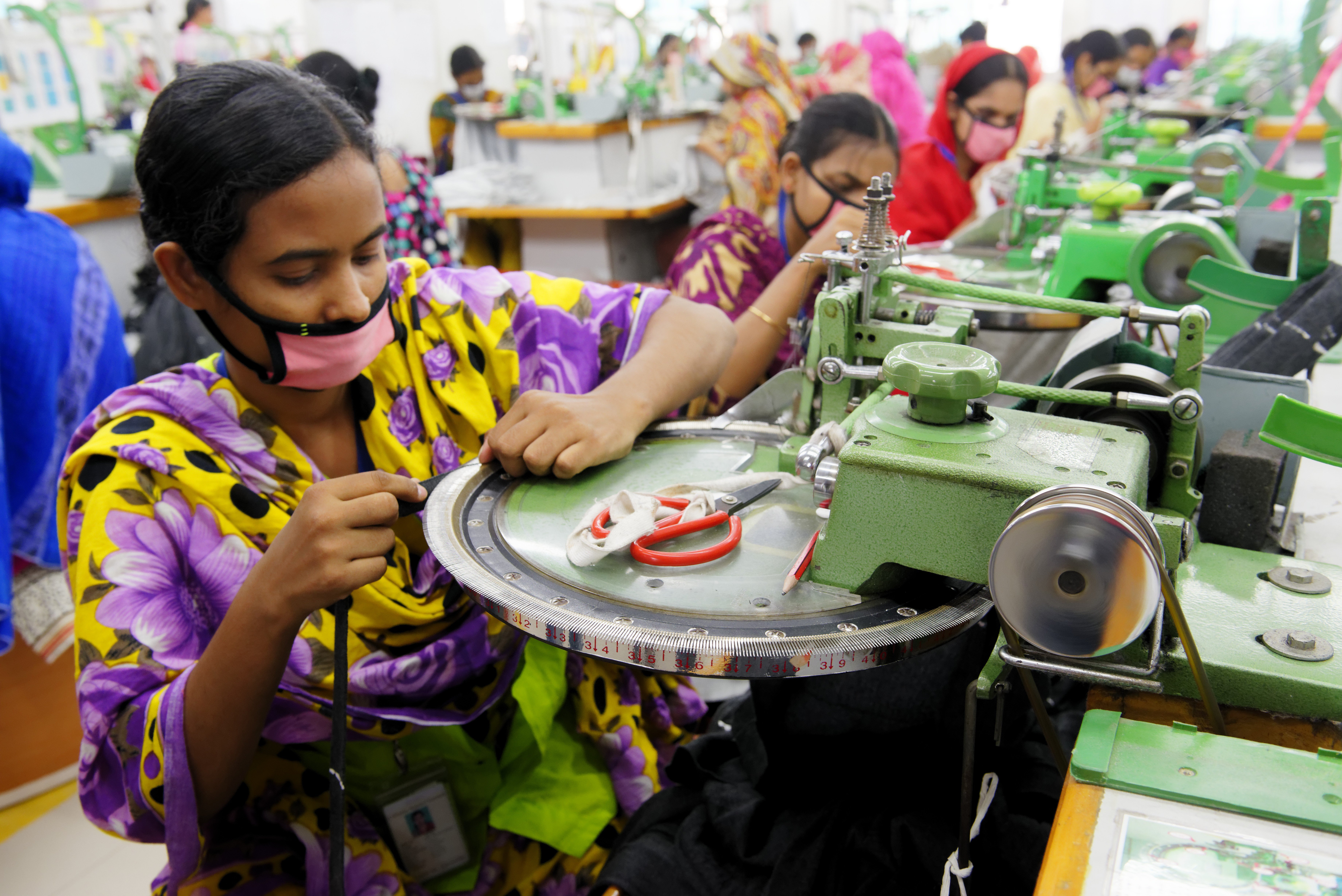 Industry figures say the garment factory trade has turned a corner. But even if safety has improved, wages are another matter