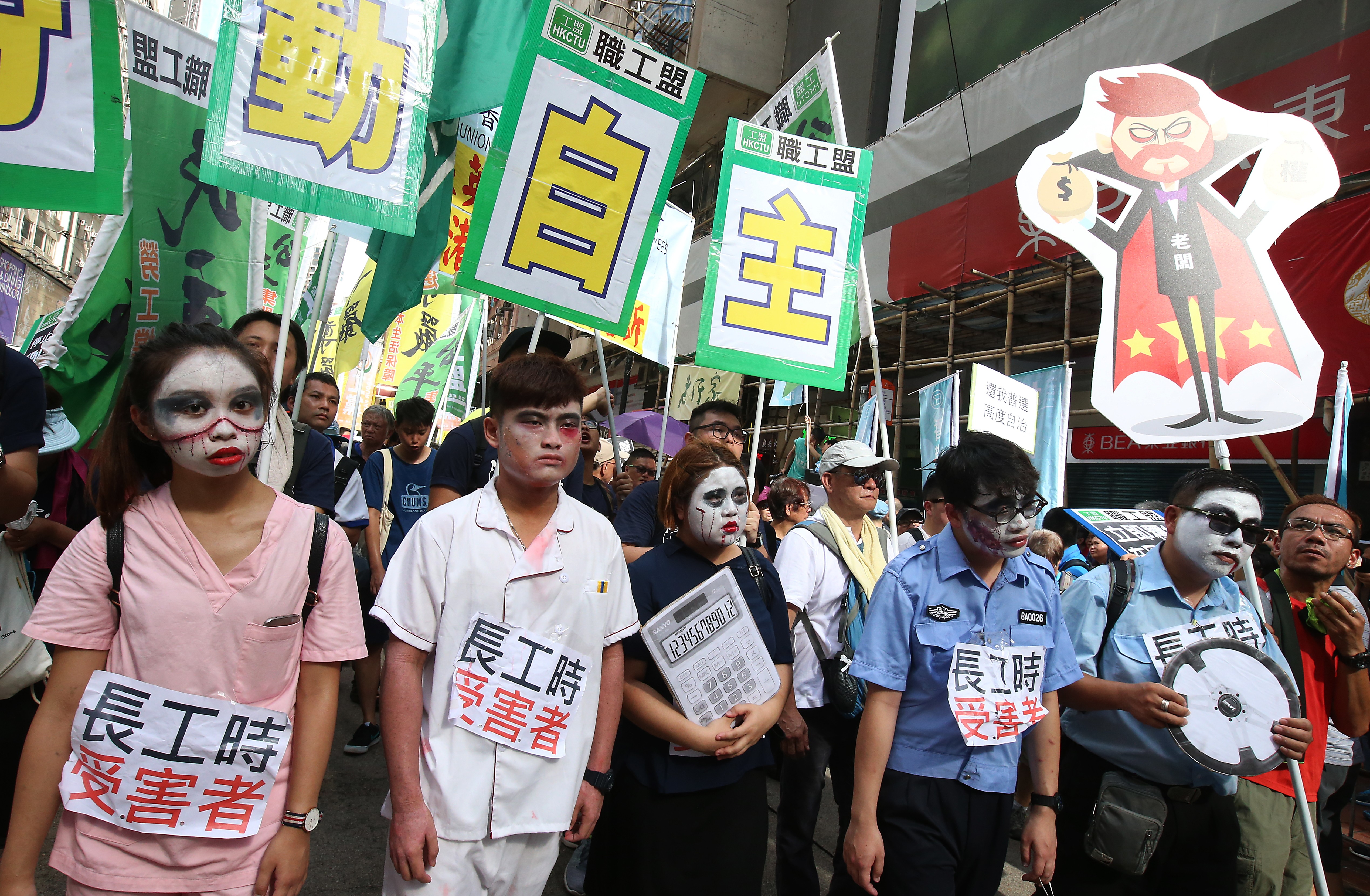 Participants in the annual July 1 march, from Victoria Park to the Hong Kong government headquarters in Admiralty, last year. Photo: David Wong