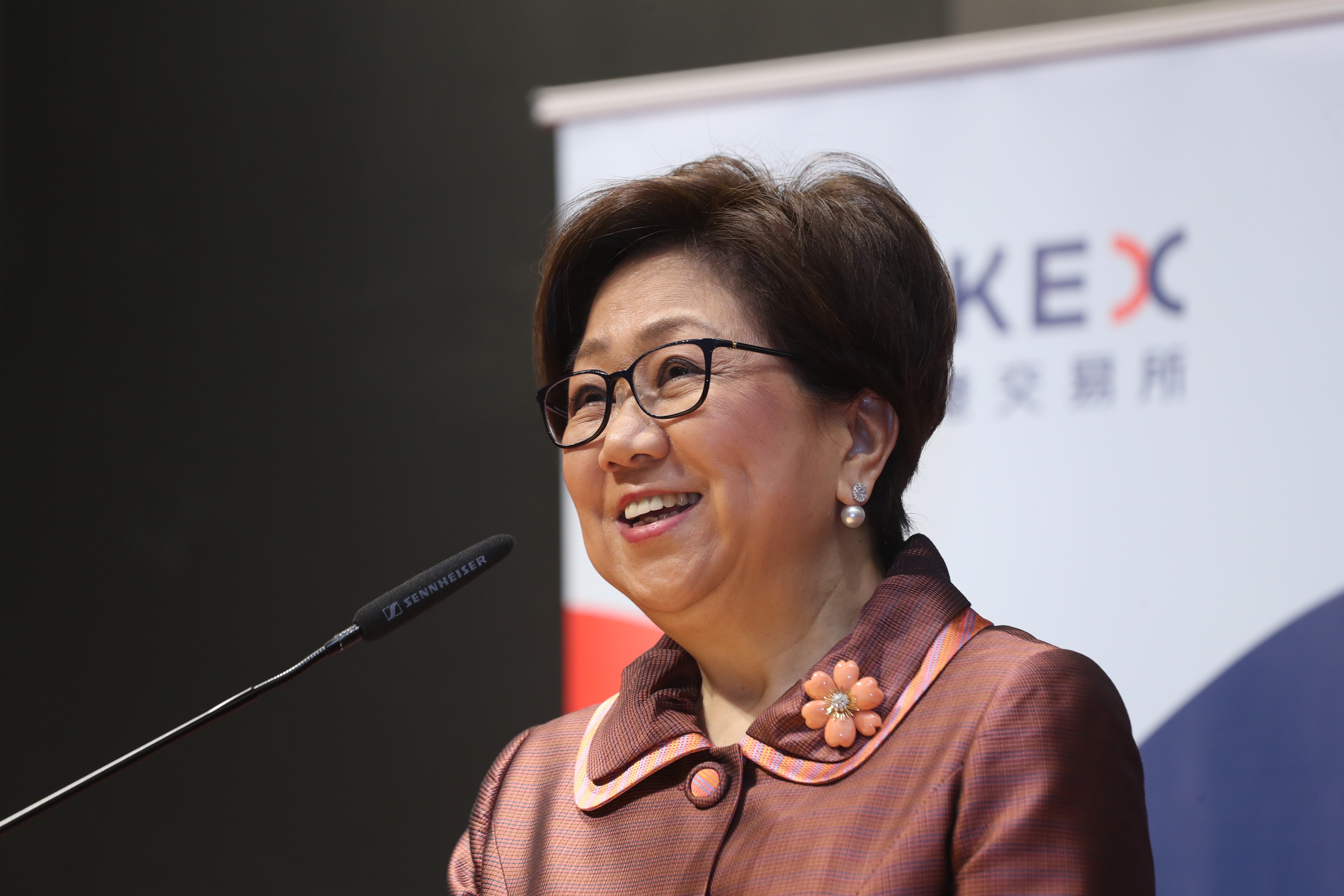 Laura Cha, the new chairwoman of Hong Kong Exchanges and Clearing, speaks to the media in Hong Kong on Thursday. Photo: K. Y. Cheng