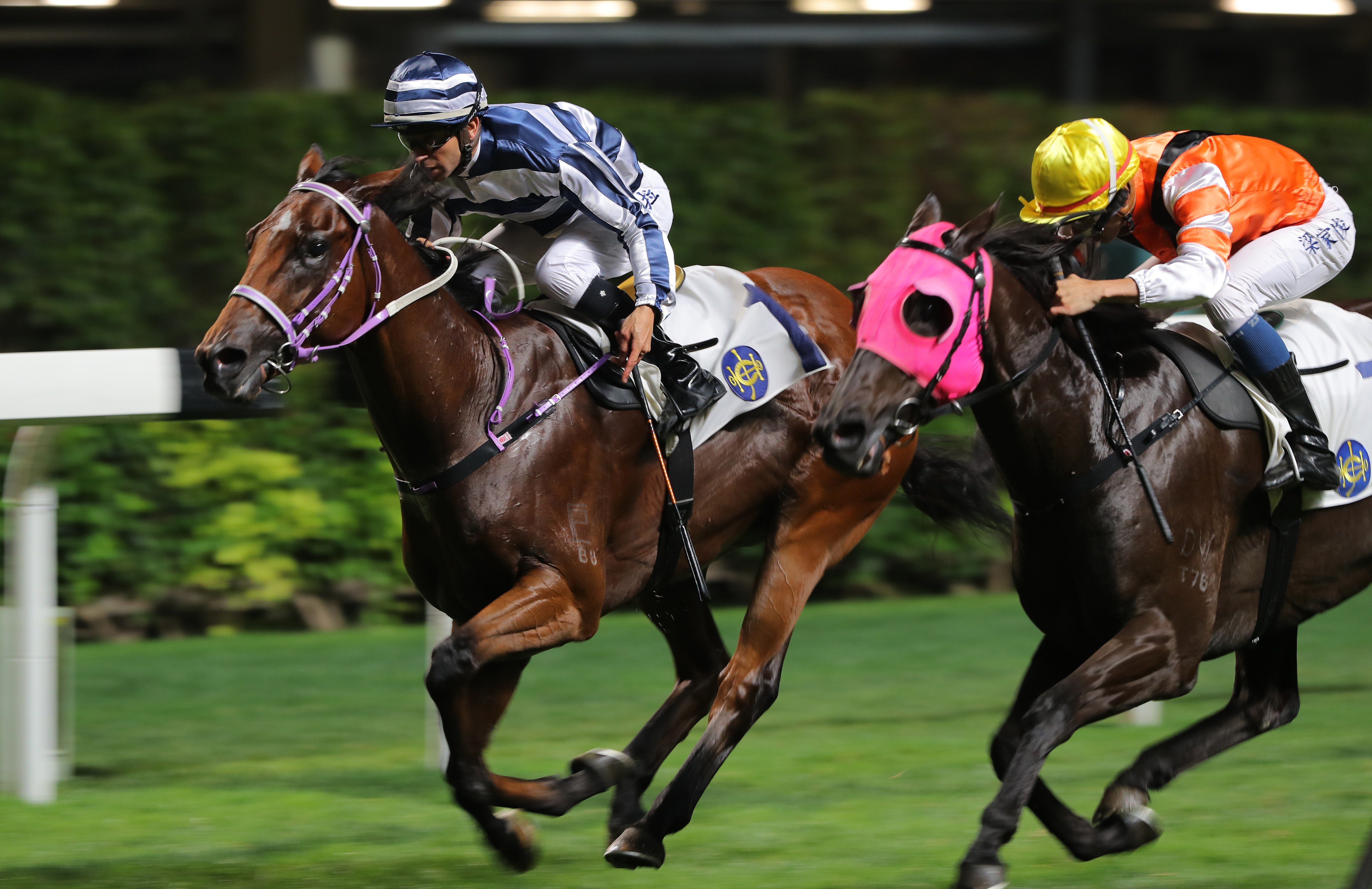 Joao Moreira pushes out Eighty Eighty to victory on Wednesday night. Photo: Kenneth Chan