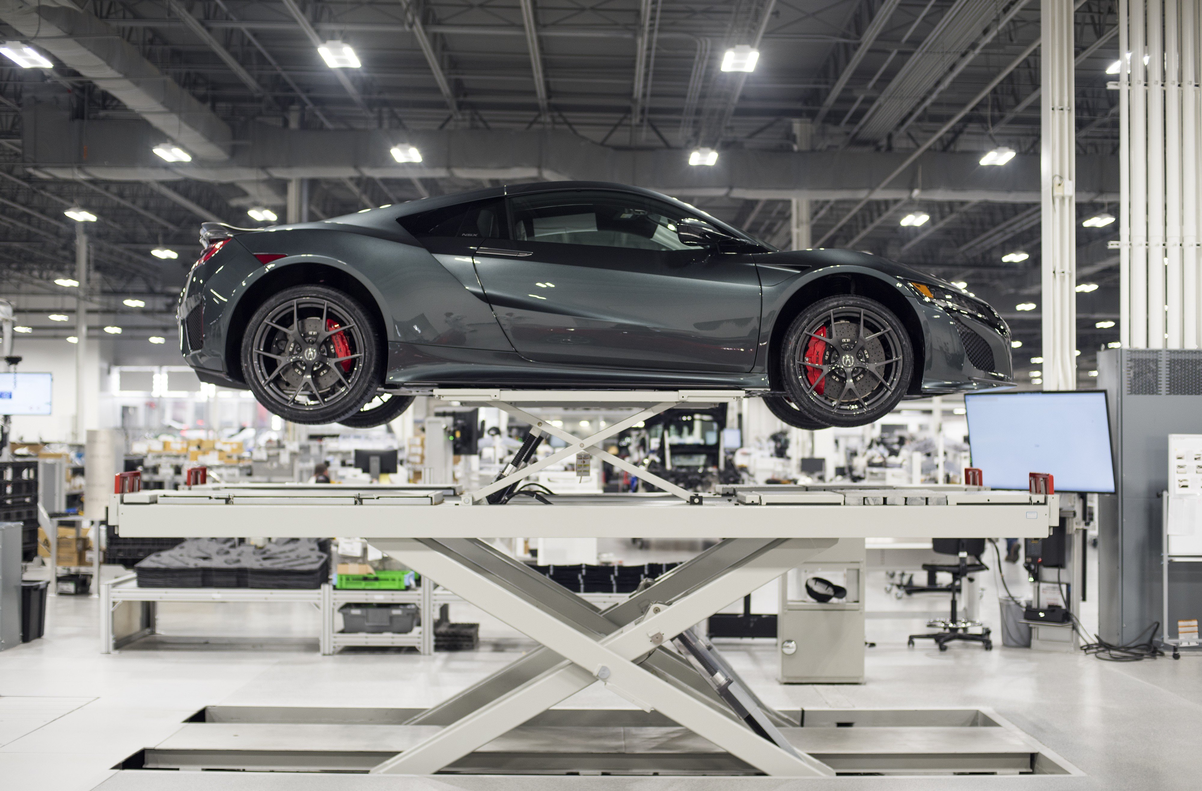 A Honda Motor Company 2017 Acura NSX sits on a lift at the Honda Performance Manufacturing Centre in Marysville, Ohio, in November 2016. Japan multinationals contribute the most foreign investment in Ohio, a rust belt swing state that responded favourably to Donald Trump’s protectionist rhetoric in the 2016 election. Photo: Bloomberg