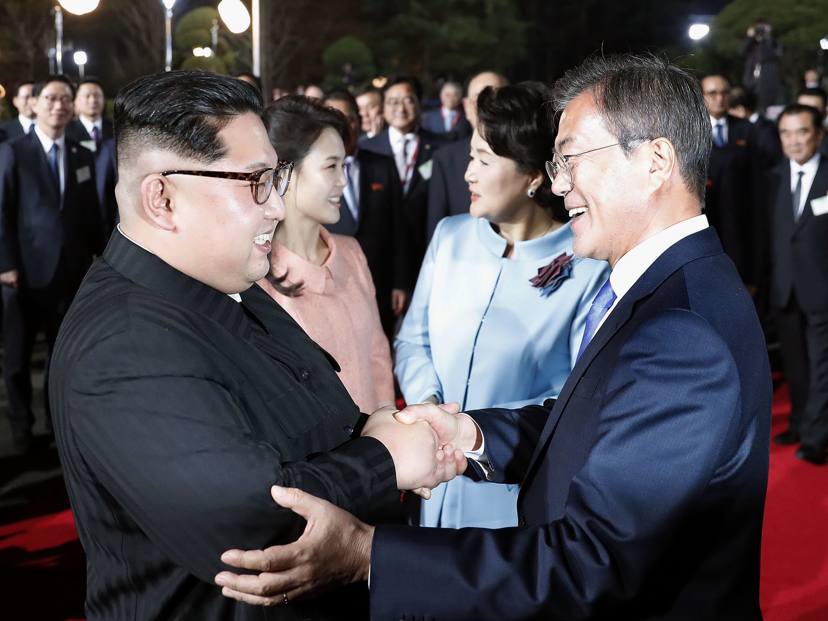 North Korean leader Kim Jong-un and South Korean President Moon Jae-in bid farewell at the border village of Panmunjom on April 27 following their summit meeting. Photo: Kyodo