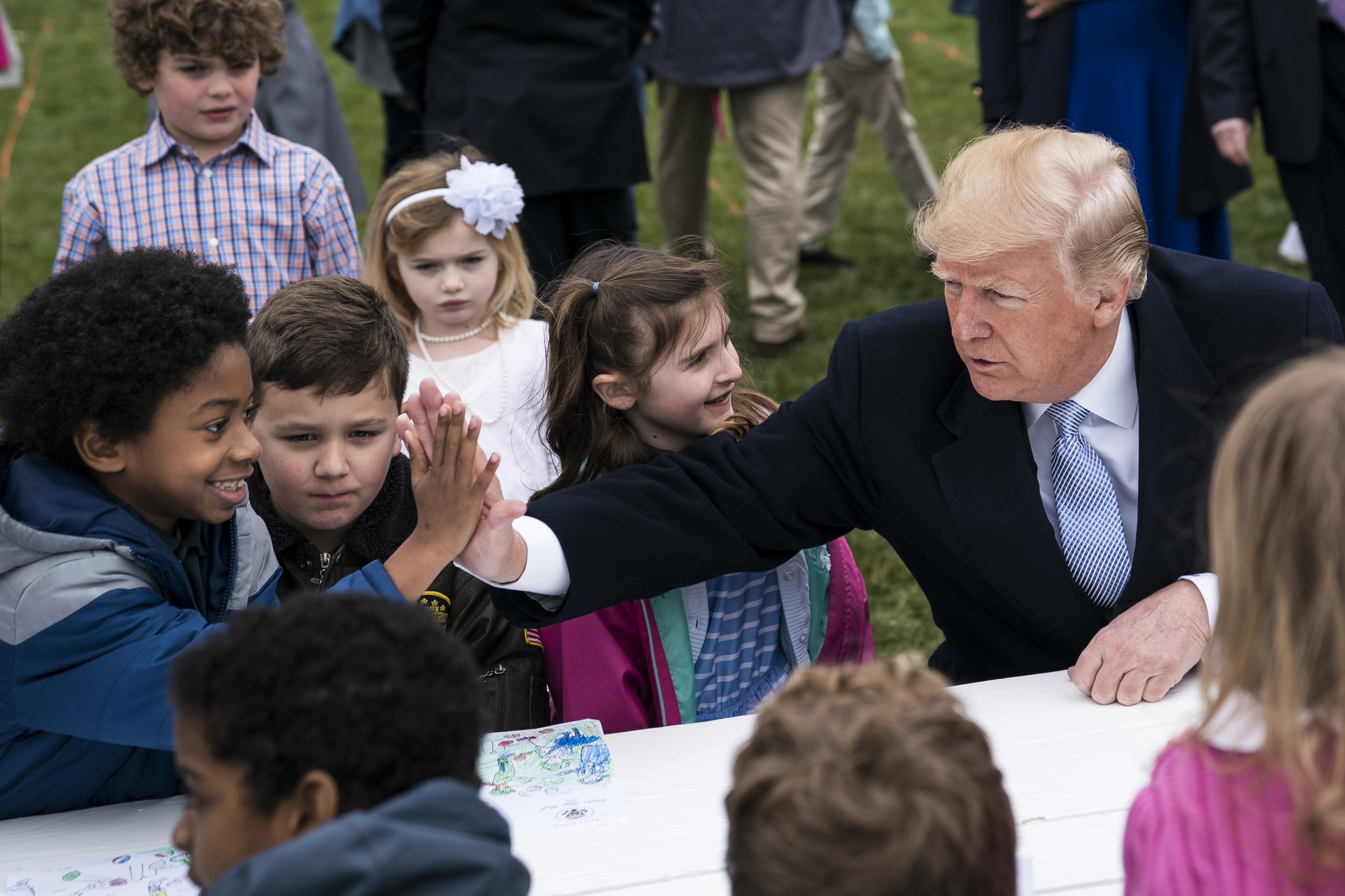 President Donald Trump greets children at the White House on April 2. Speculation is rife about Trump’s mental fitness for office. Photo: Washington Post