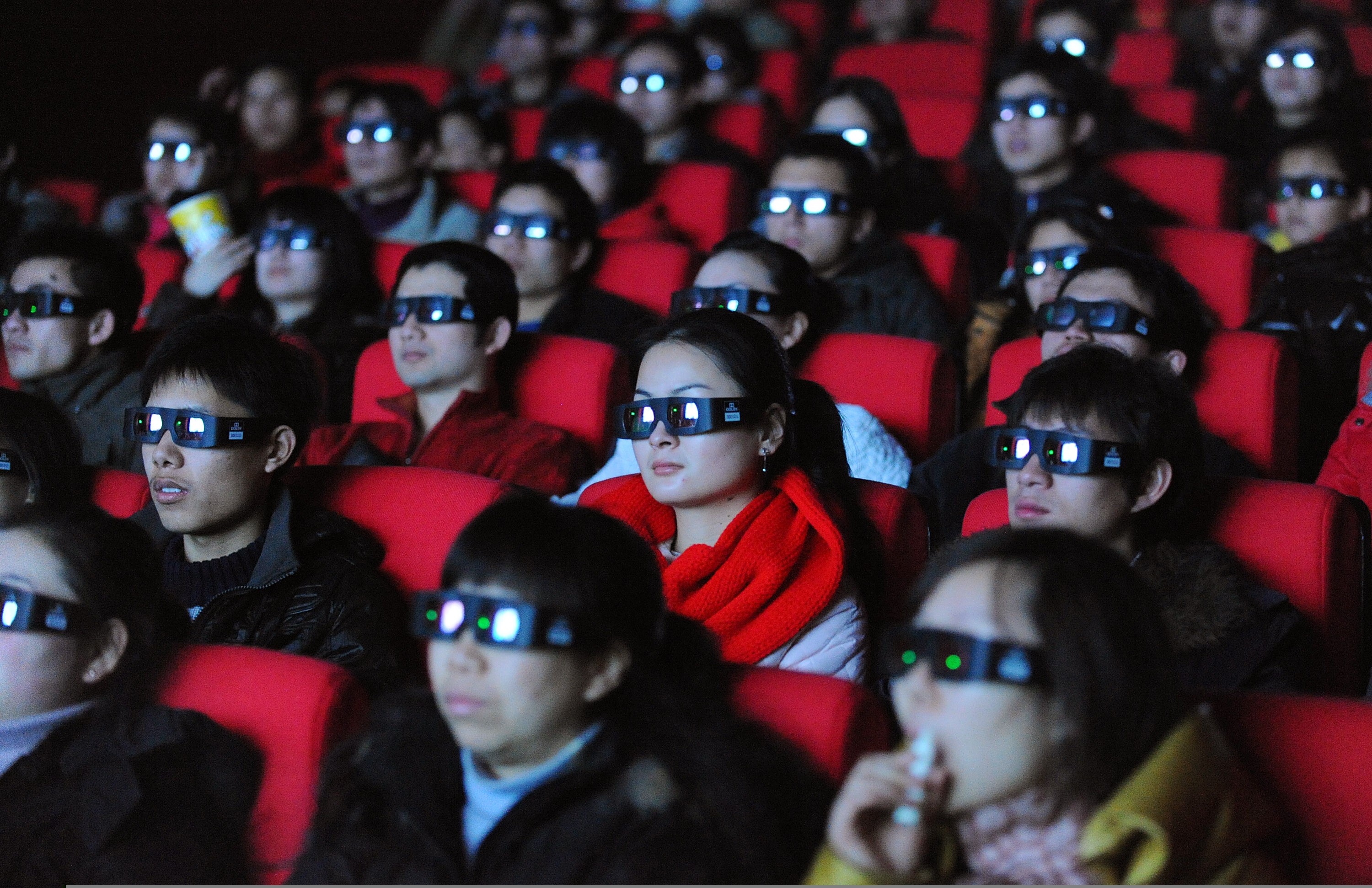 Chinese cinemagoers watch the 3D science-fiction blockbuster Avatar in Hefei, Anhui province, in January 2010. Hollywood films a decade ago contributed over 50 per cent to China’s box-office revenue, but they have been upstaged by domestic films and other Asian productions. Photo: AFP 