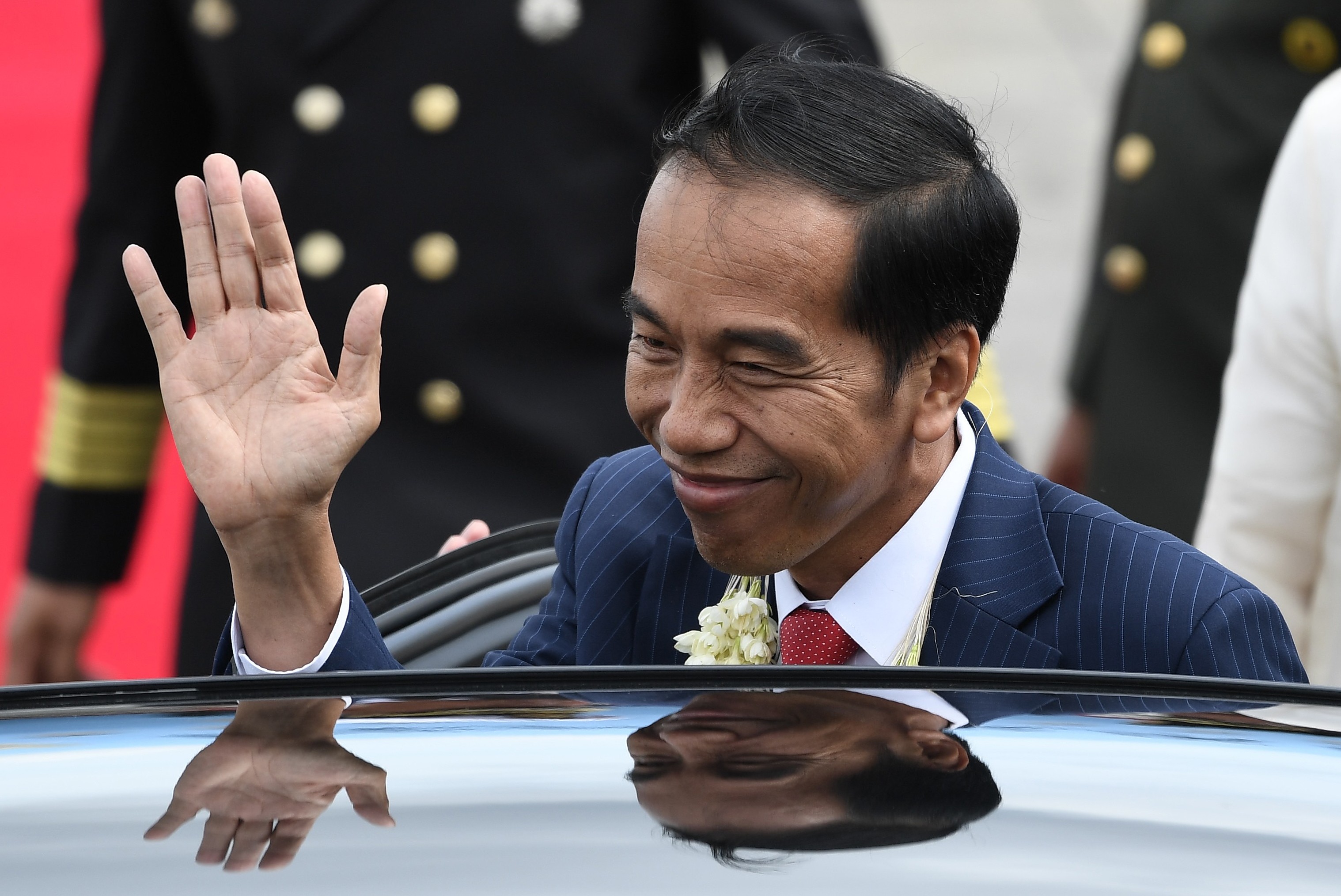 Indonesia's President Joko Widodo hopes to land a second five-year term at the next election. But he must balance public opinion of his relationship with China, a slow moving infrastructure plan and an influx of Chinese workers. Photo: AFP