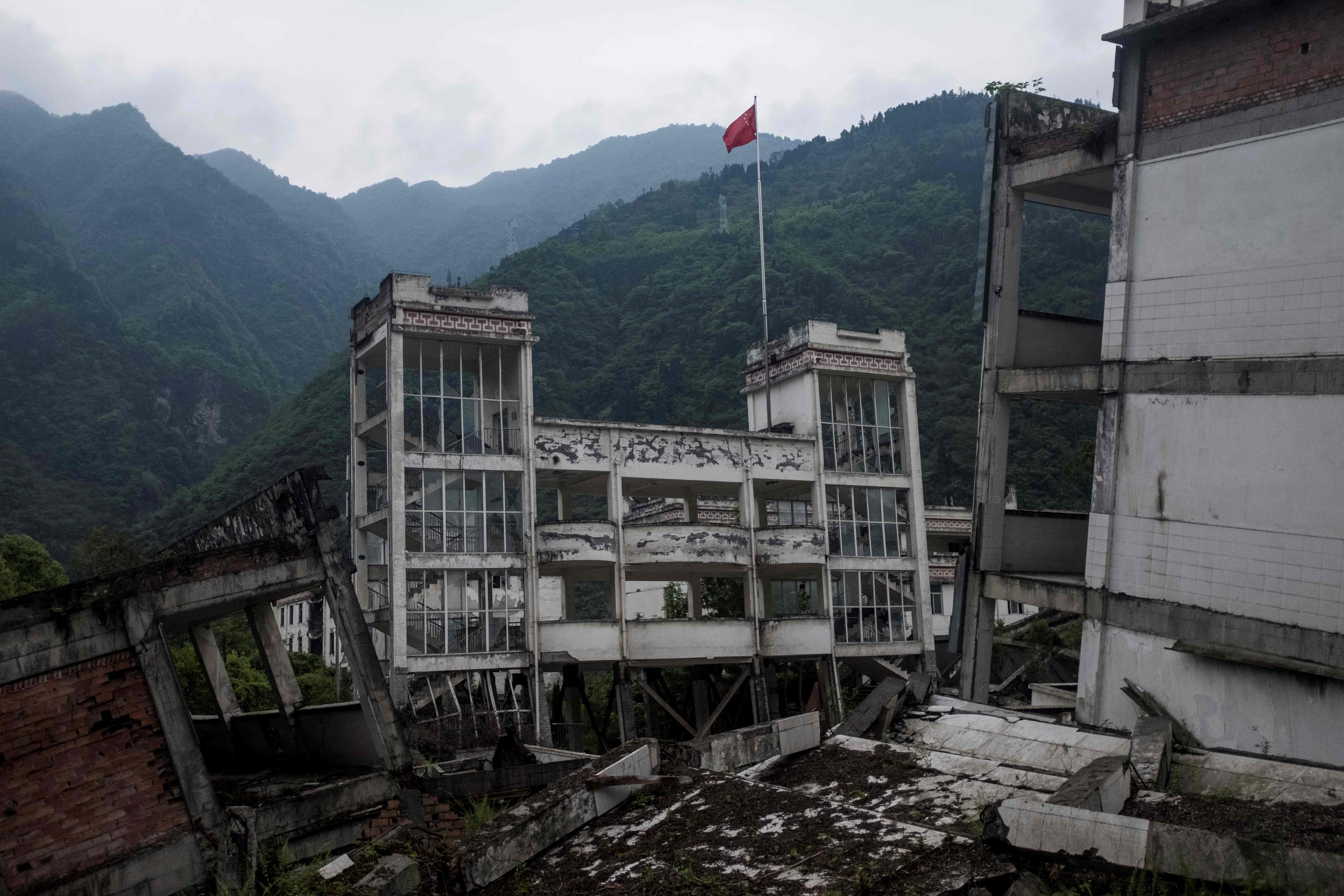 This picture taken on April 21, 2018 shows part of the destroyed Xuankou Middle School, now a memorial site for the 2008 Sichuan earthquake, in Yingxiu, China. Photo: AFP