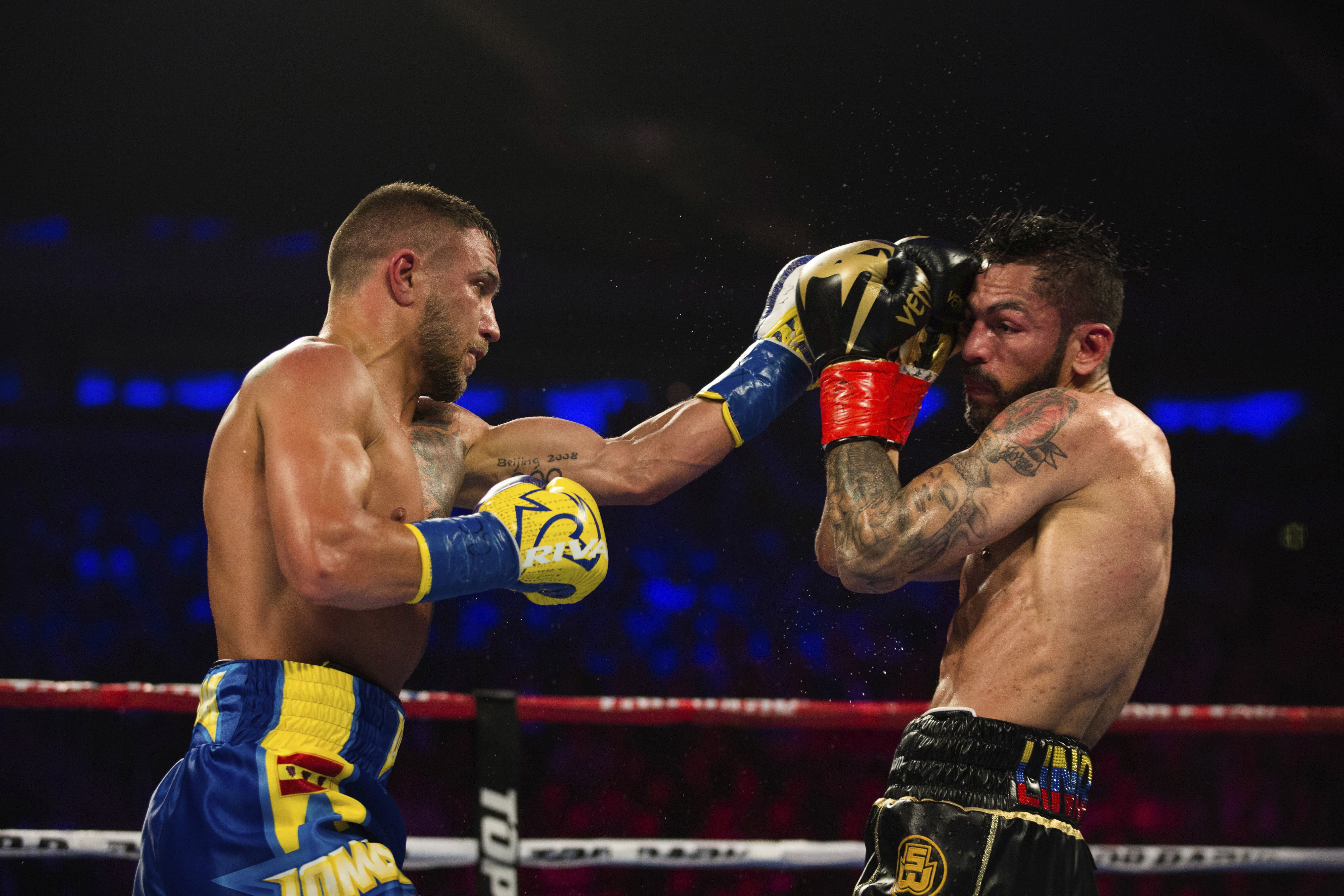Vasiliy Lomachenko stops Jorge Linares in 10th to claim