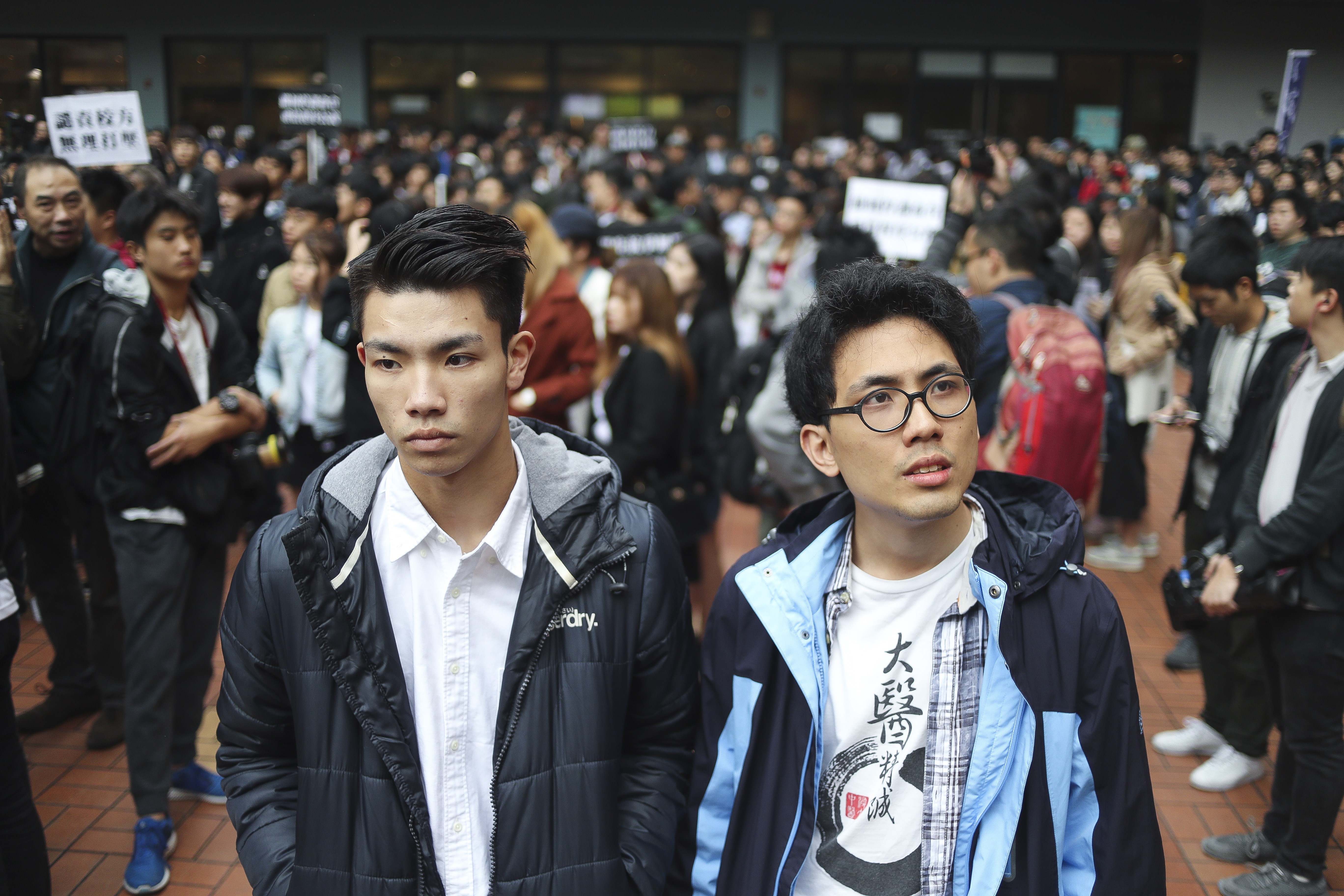 Baptist University student Lau Tsz-kei (left) did not protest the school’s disciplinary decision, but Andrew Chan Lok-hang (right) did. His appeal was rejected. Photo: Winson Wong