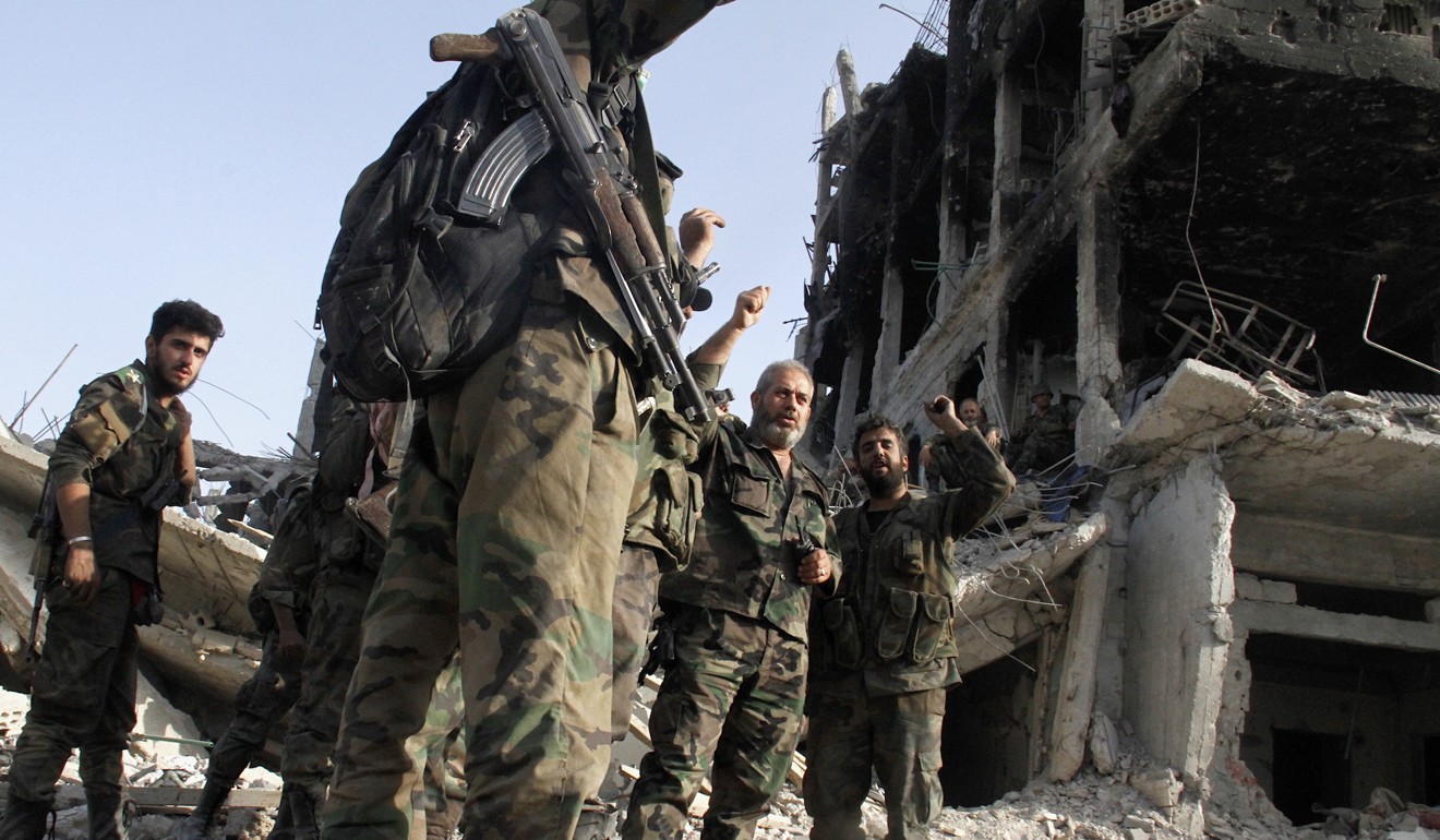 Syrian army declares Damascus, outskirts 'completely secure